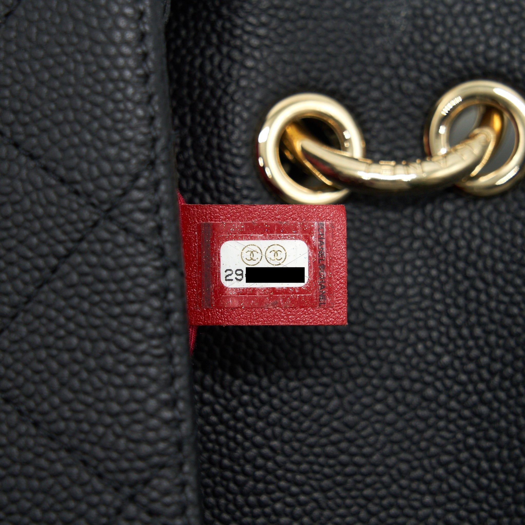 Chanel Caviar quilted flap Bag with handle and Chain Black L