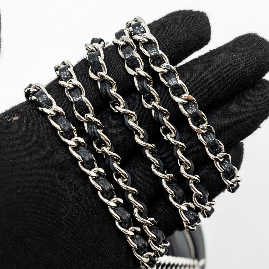 Chanel round sip clutch with chain caviar black