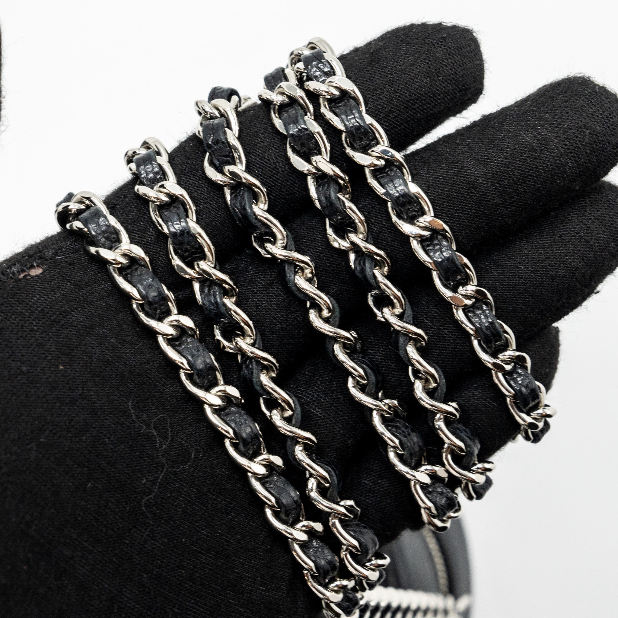 Chanel round sip clutch with chain caviar black