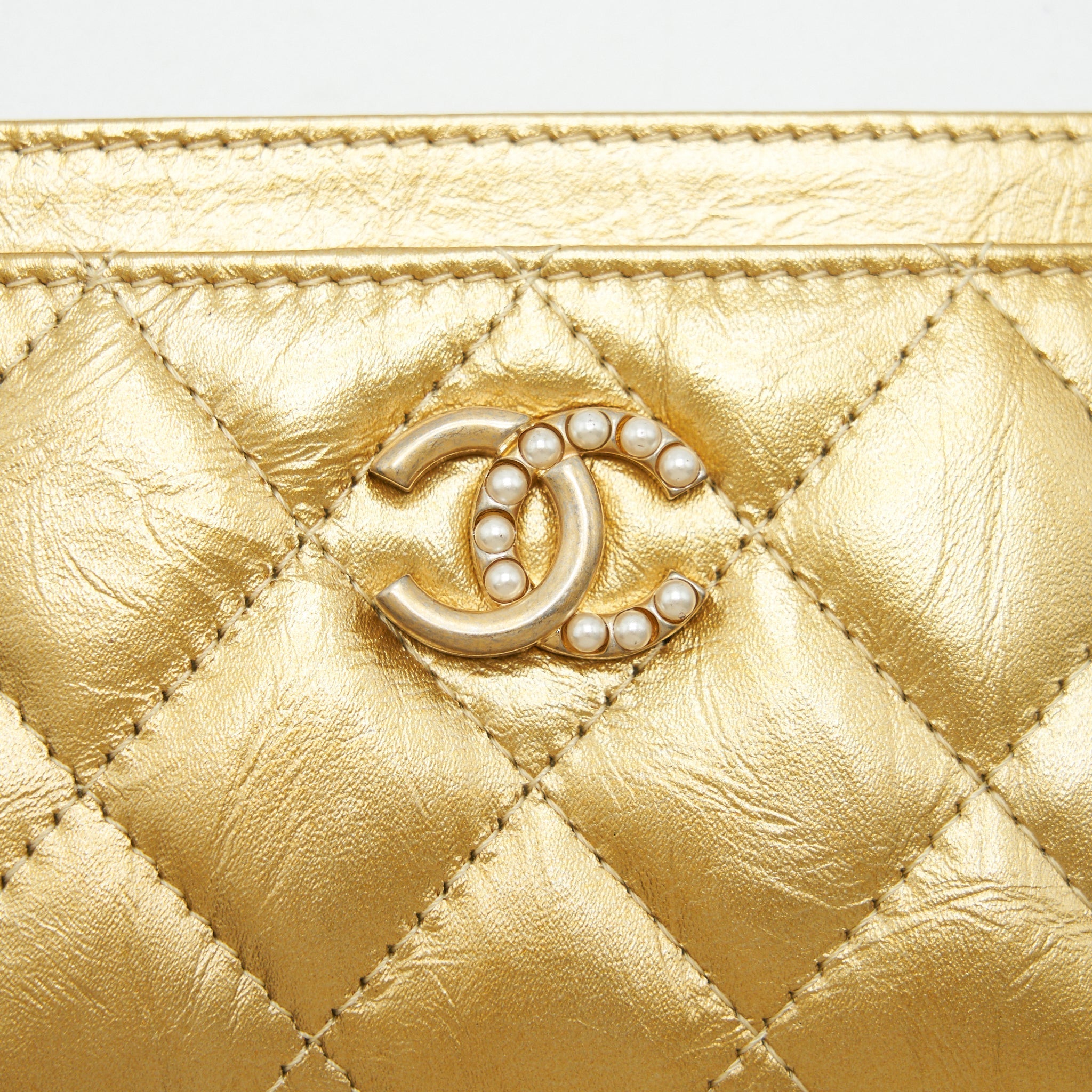 Chanel Quilted  Holder Lambskin Gold Colour with Gold and Pearl CC Logo