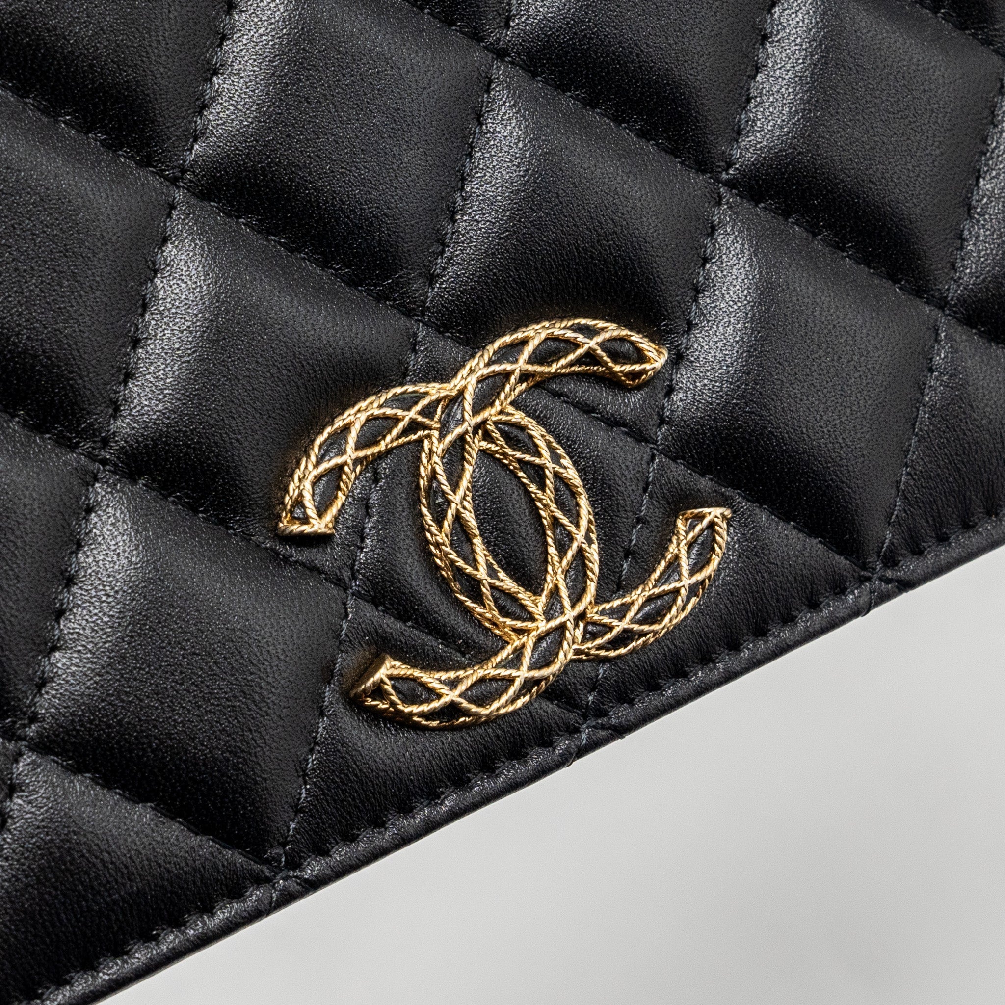 Chanel 23A clutch with chain lambskin black  (microchip)