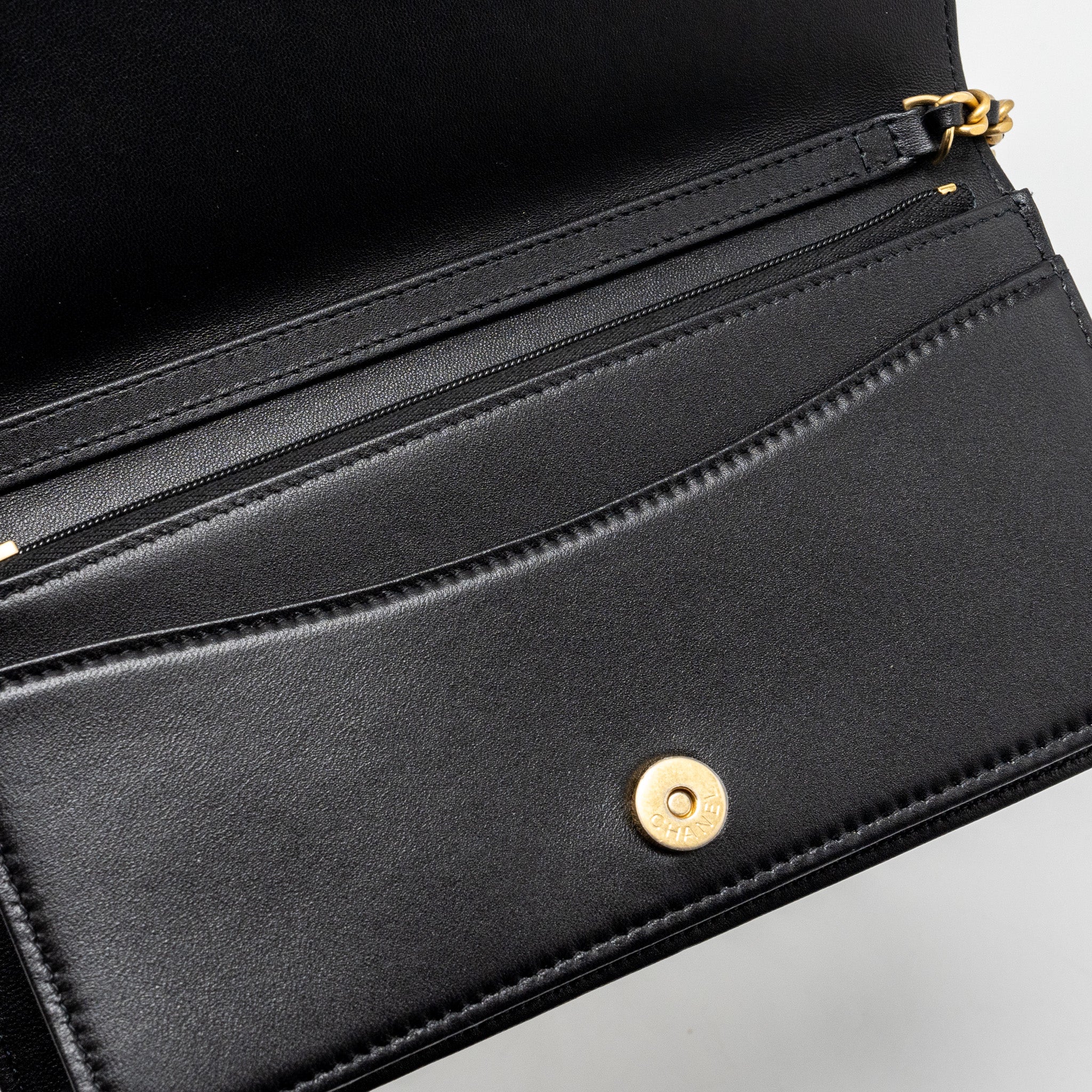 Chanel 23A clutch with chain lambskin black  (microchip)
