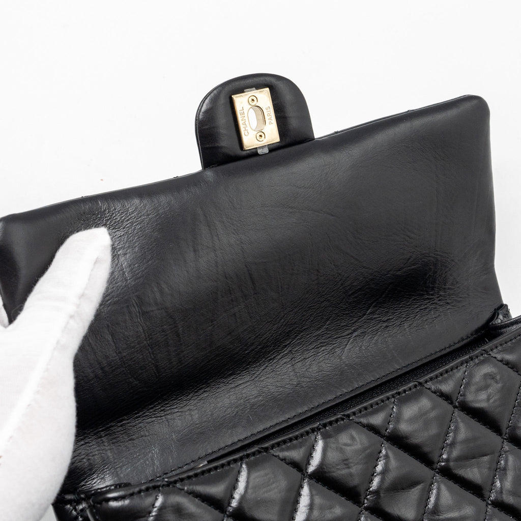 Chanel 23A classic flap clutch shiny calfskin black L (microchip)