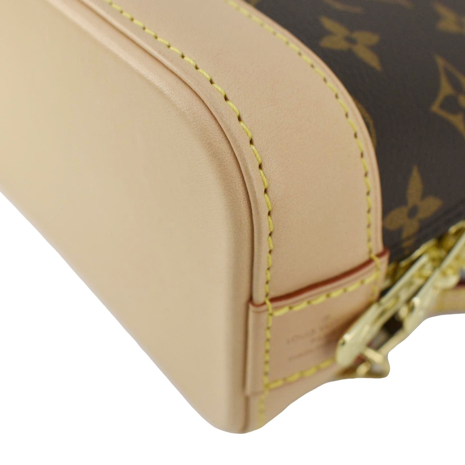 LOUIS VUITTON Alma Monogram Canvas Backpack Brown