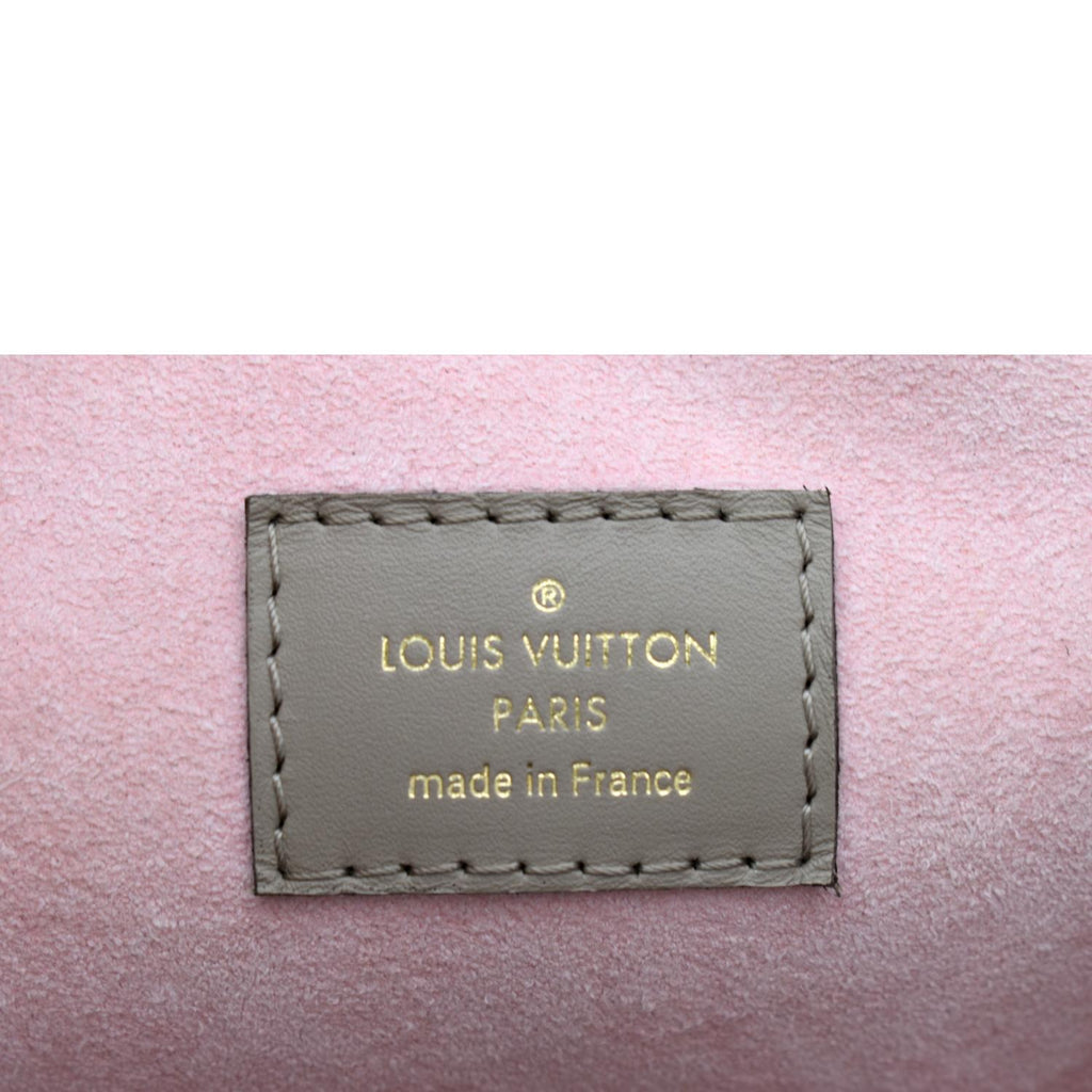 LOUIS VUITTON Montsouris Monogram Empreinte Leather Backpack Beige
