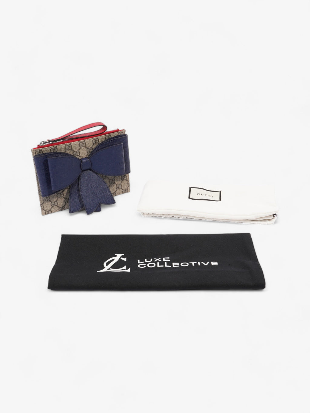 Gucci GG Bow Wristlet GG Supreme / Blue / Red Coated Canvas