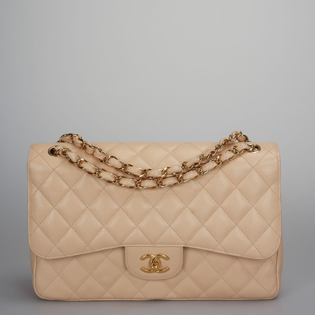 Chanel Classic Double Flap Bag Jumbo in Beige Quilted Caviar Leather with Gold Hardware