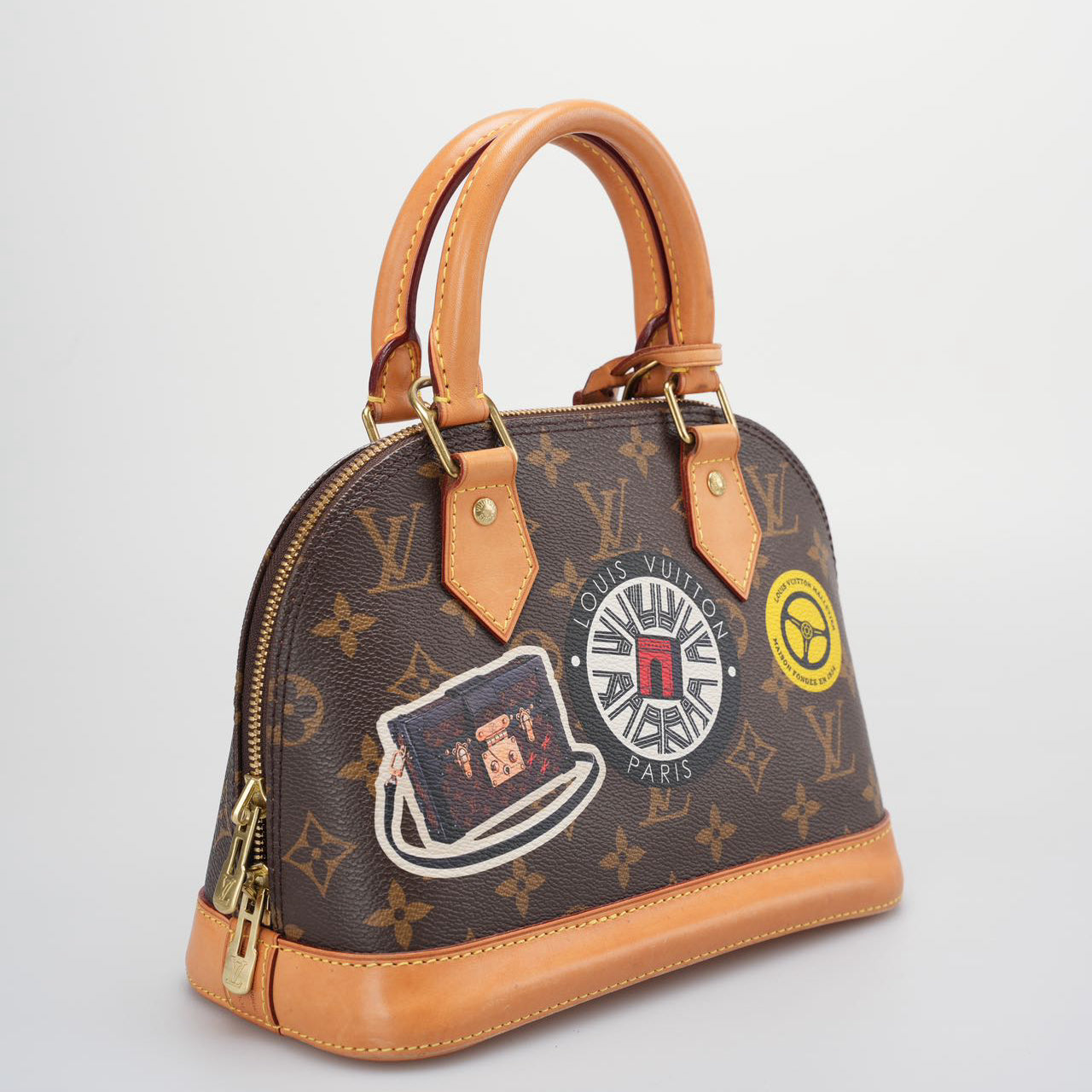 Louis Vuitton Monogram World Tour Alma BB Satchel Bag