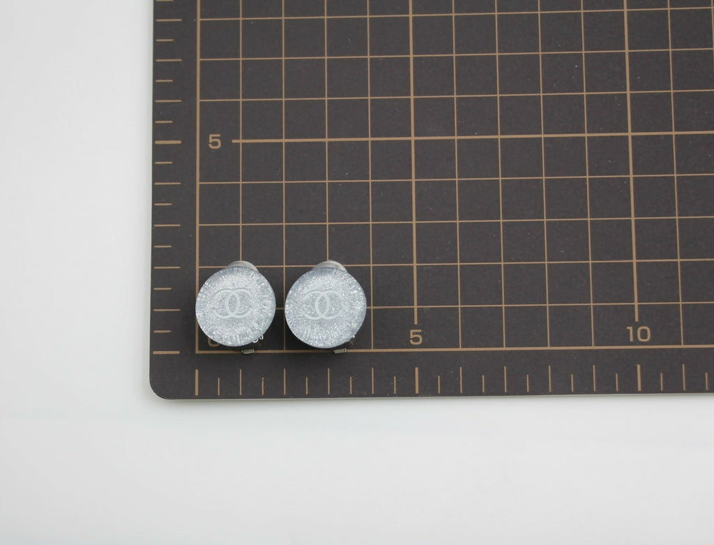 Chanel Vintage 00A Resin Light Blue Glitter Round Clip-on Earrings