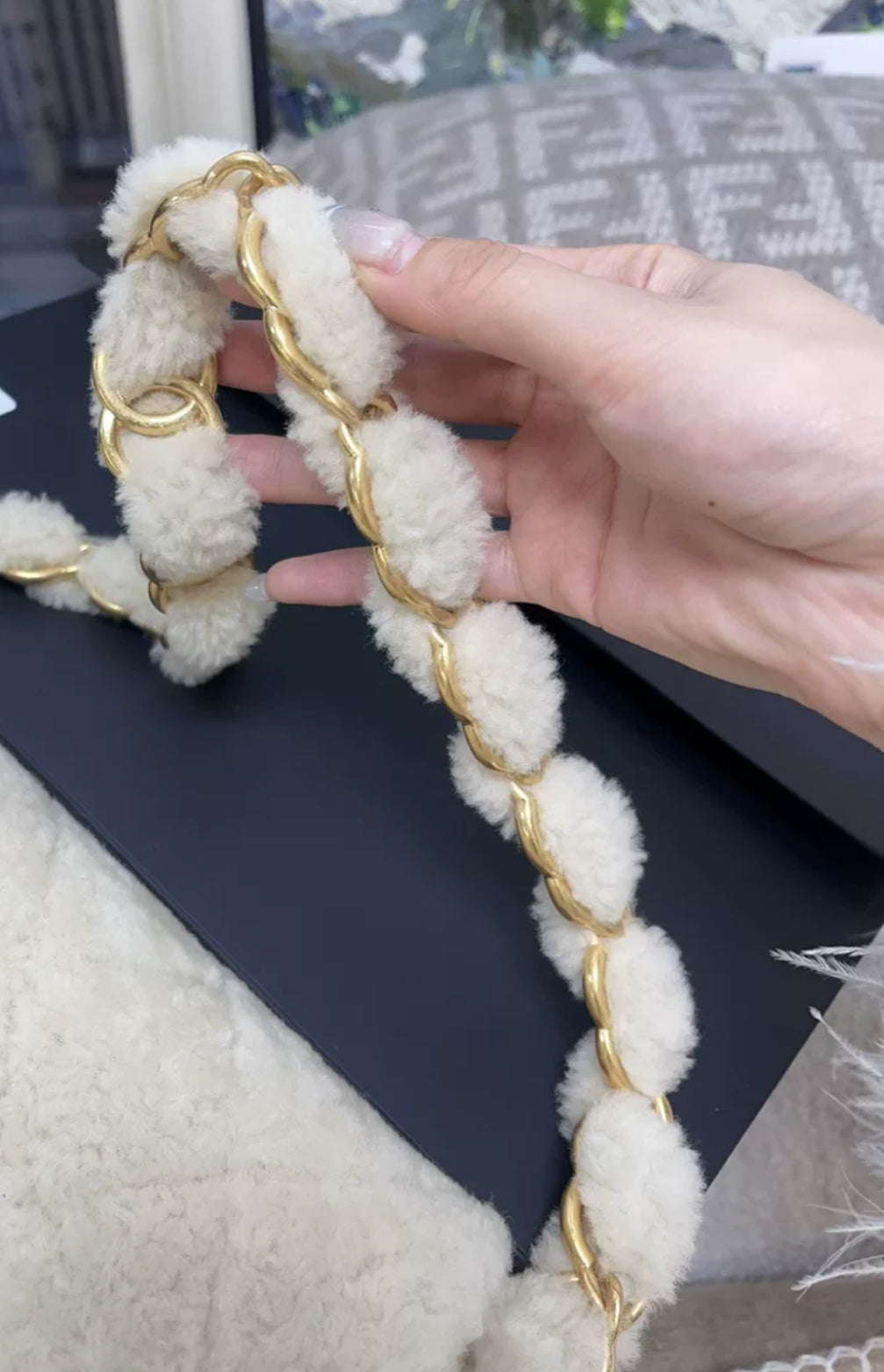 Chanel 24K off-white shearling chain flap bag with gold hardware