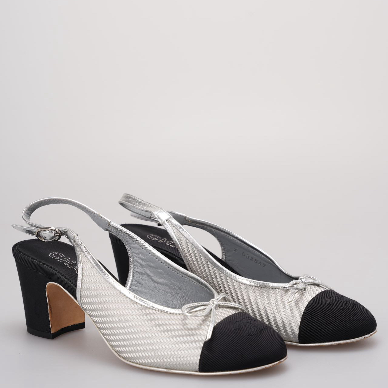 Chanel Woven Plastic Grosgrain Cap Toe CC Slingback Pumps in black and silver 39.5