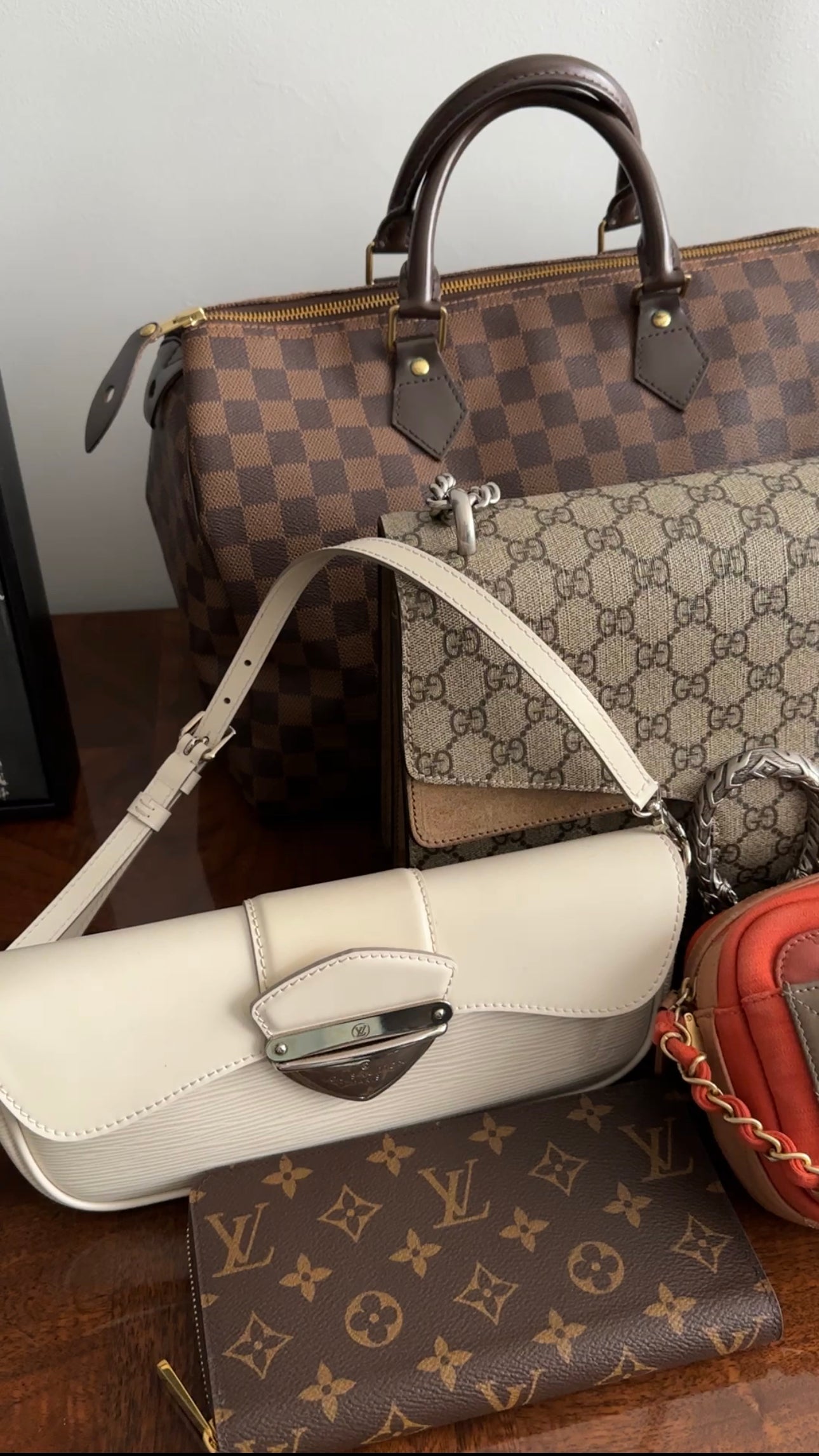 Louis Vuitton Ivory Epi Montagne Pochette Bag