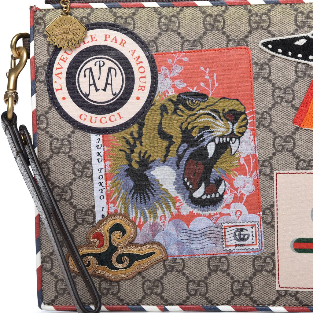 GUCCI GG SUPREME COURIER CLUTCH BAG