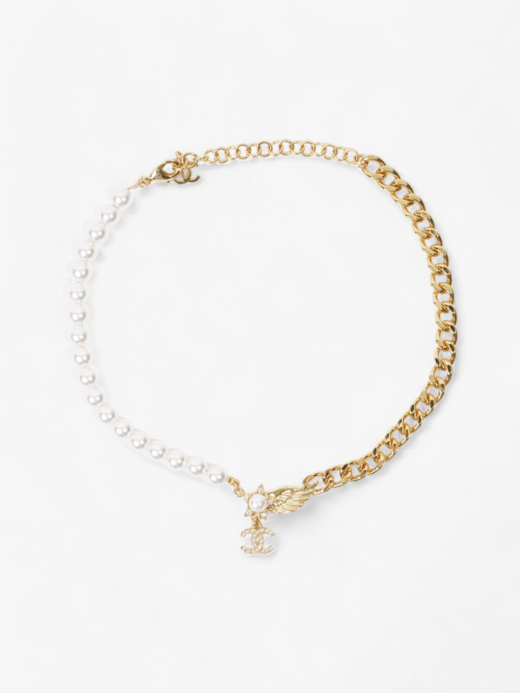 Chanel CC Star Wing Faux Pearl Choker Pearl / Gold Base Metal