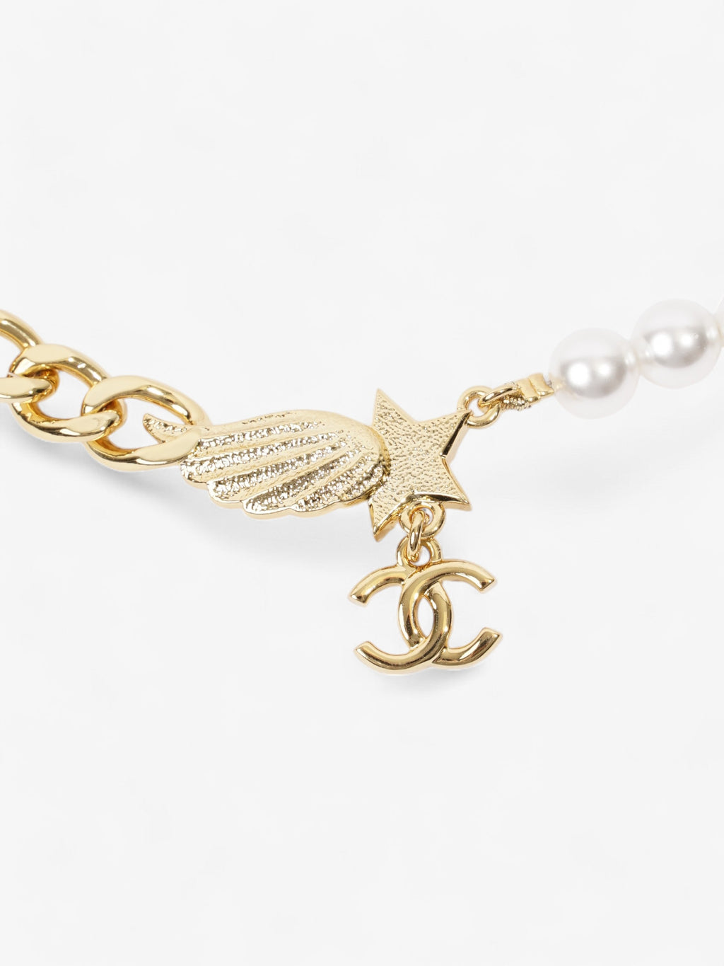 Chanel CC Star Wing Faux Pearl Choker Pearl / Gold Base Metal