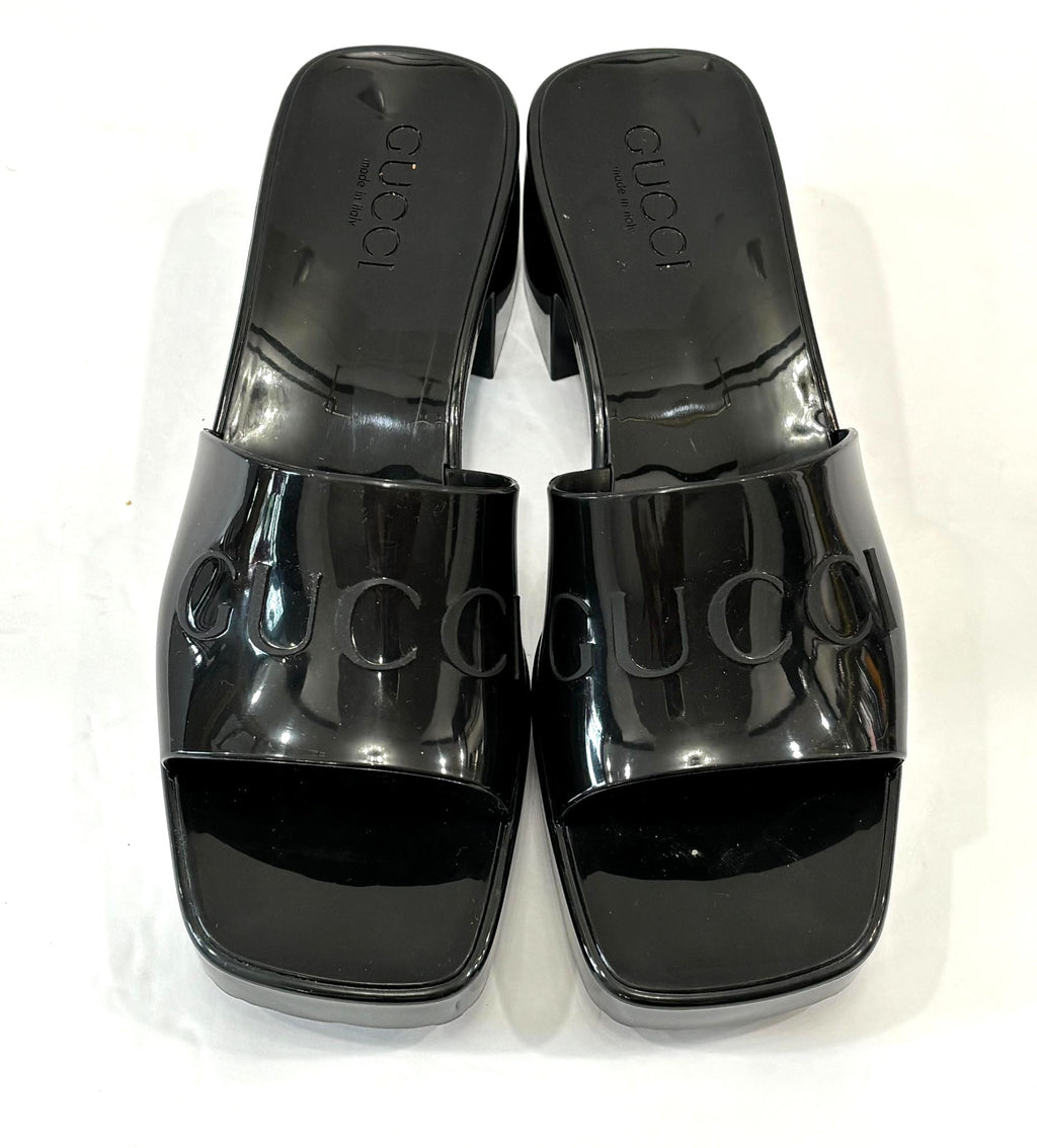 GUCCI EMBOSSED LOGO RUBBER PLATFORM SANDALS