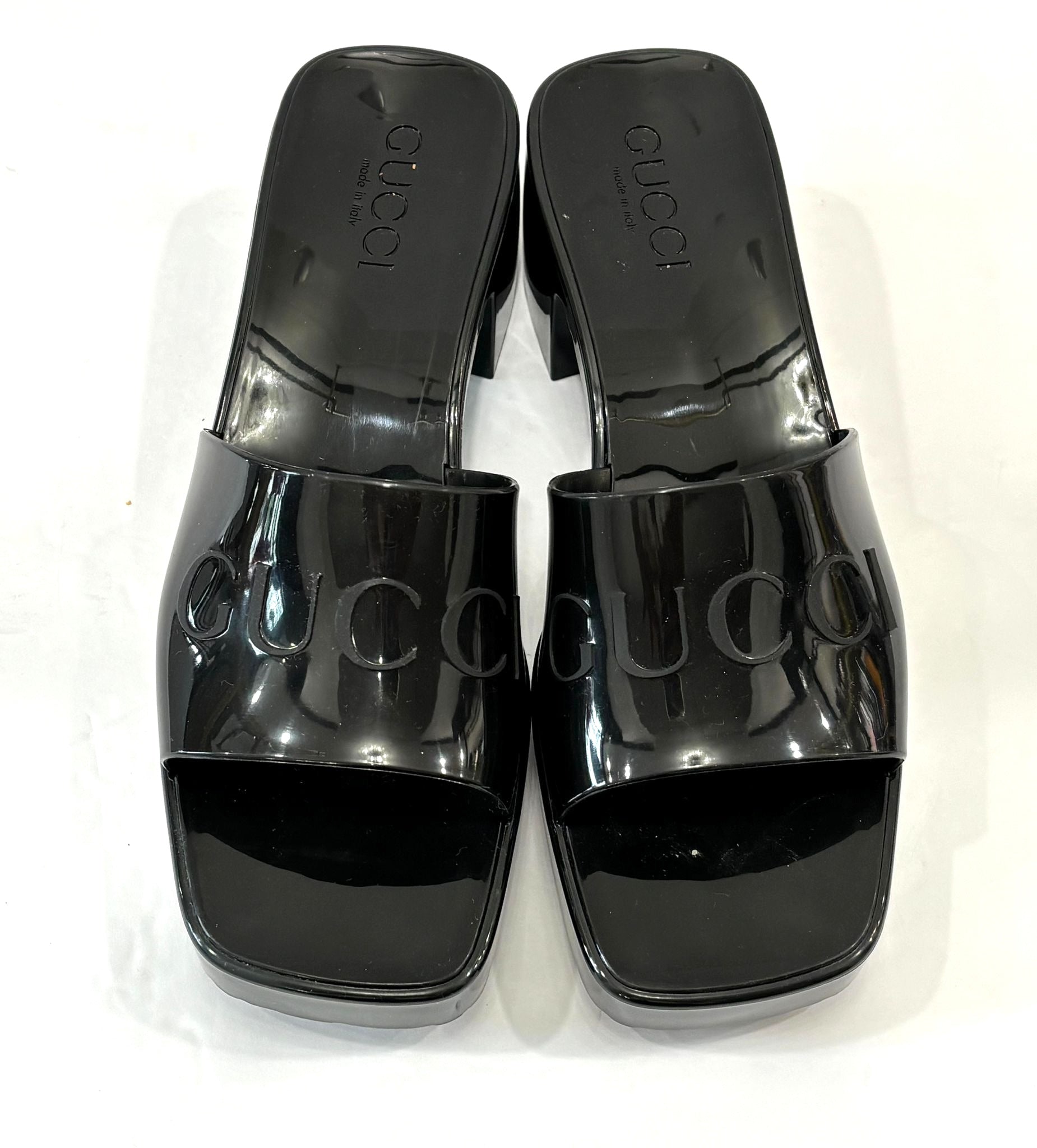 GUCCI EMBOSSED LOGO RUBBER PLATFORM SANDALS