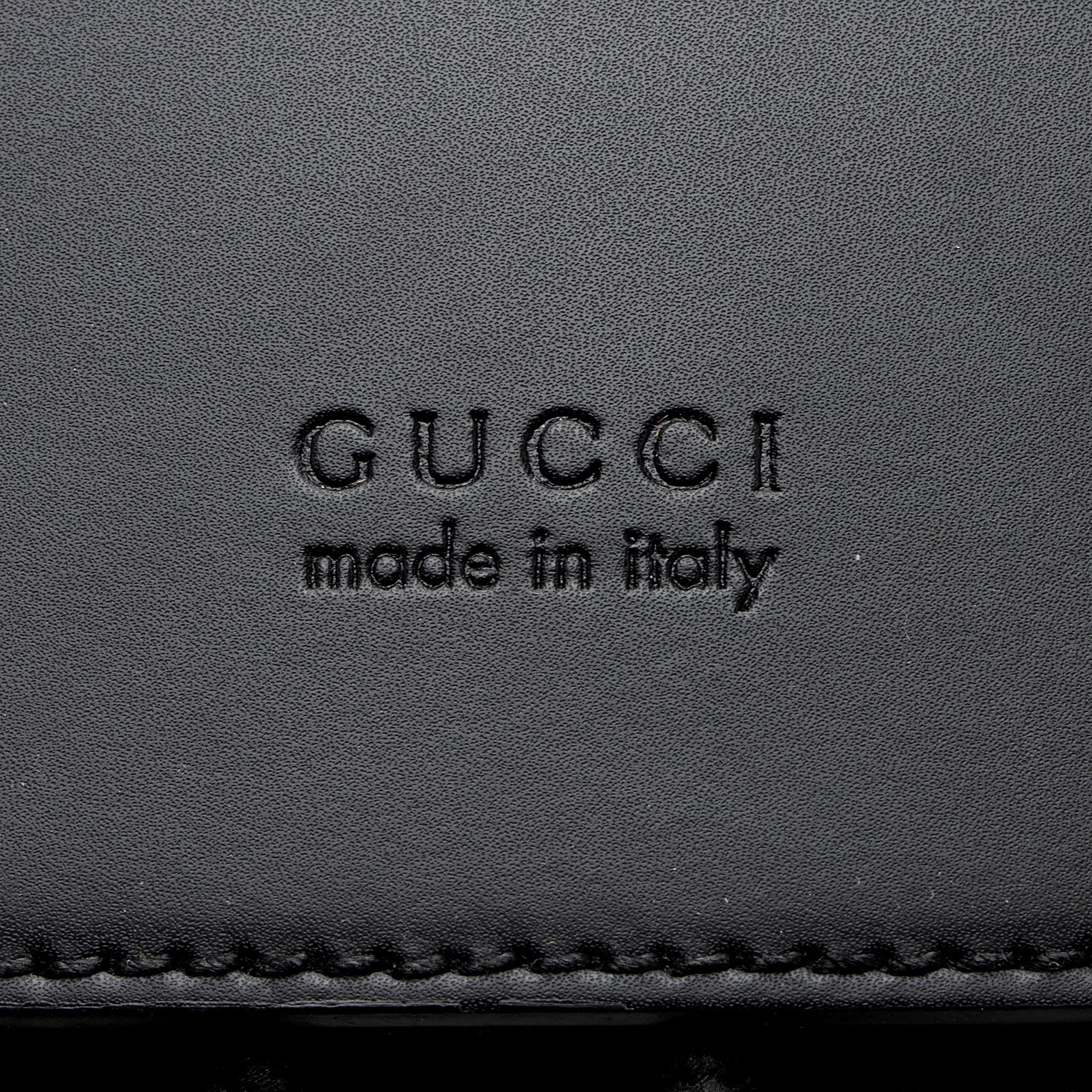 Gucci GG Supreme Medium Flap Backpack (SHF-NNj9Jx)