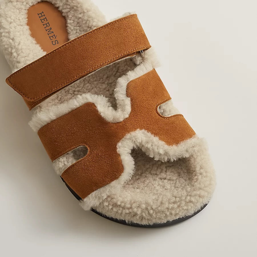 HERMÈS CHYPRE SUEDE SHEARLING SANDAL MULES