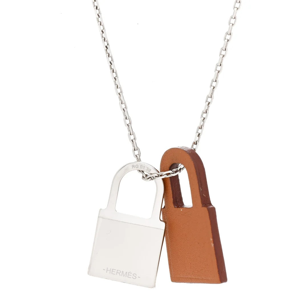 HERMÈS SWIFT O'KELLY PALLADIUM PLATED PENDANT NECKLACE