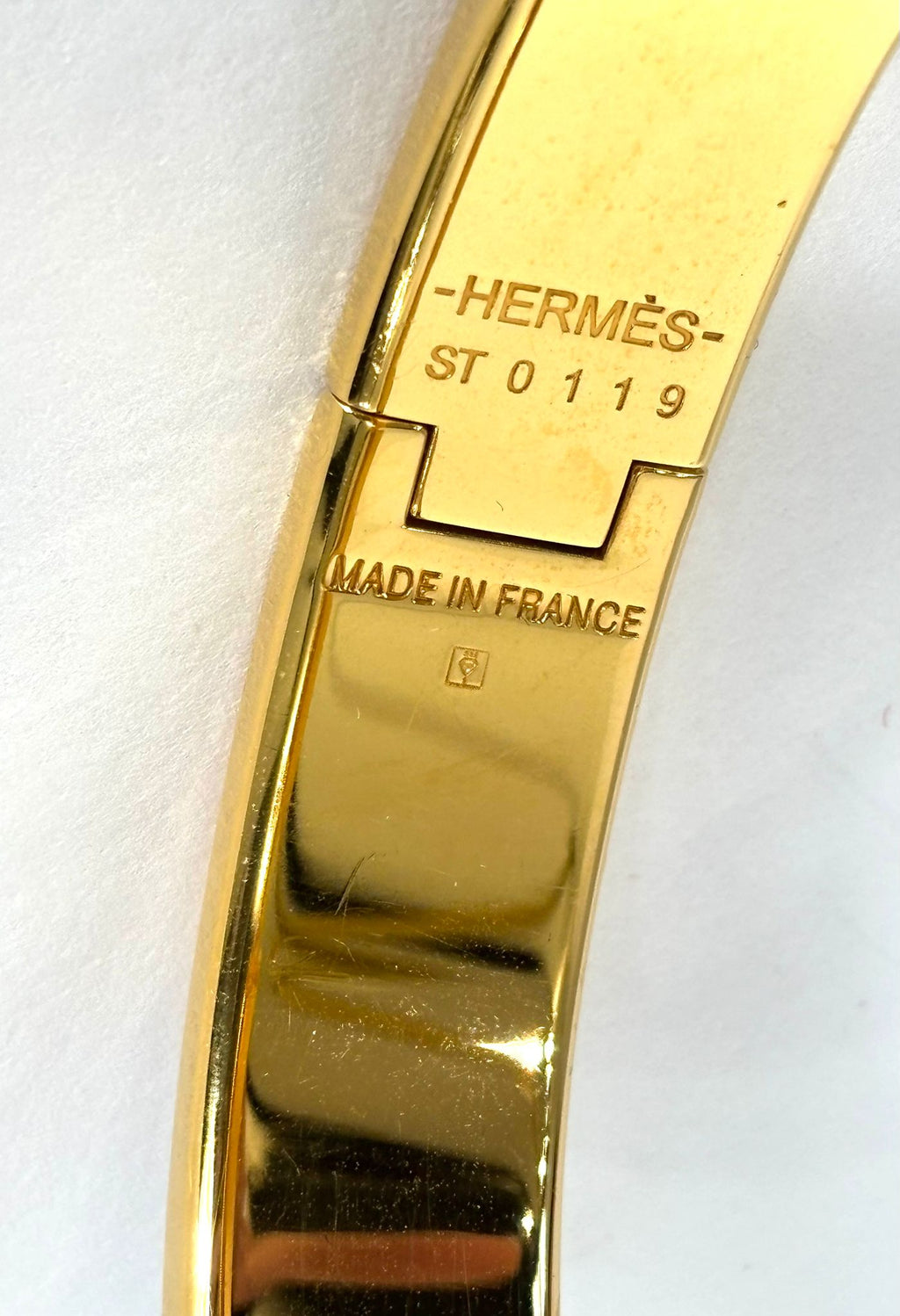 HERMÈS MARRON GLACE ENAMEL AND GOLD METAL CLIC H BRACELET