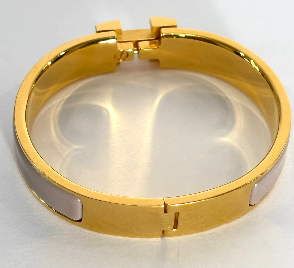 HERMÈS MARRON GLACE ENAMEL AND GOLD METAL CLIC H BRACELET