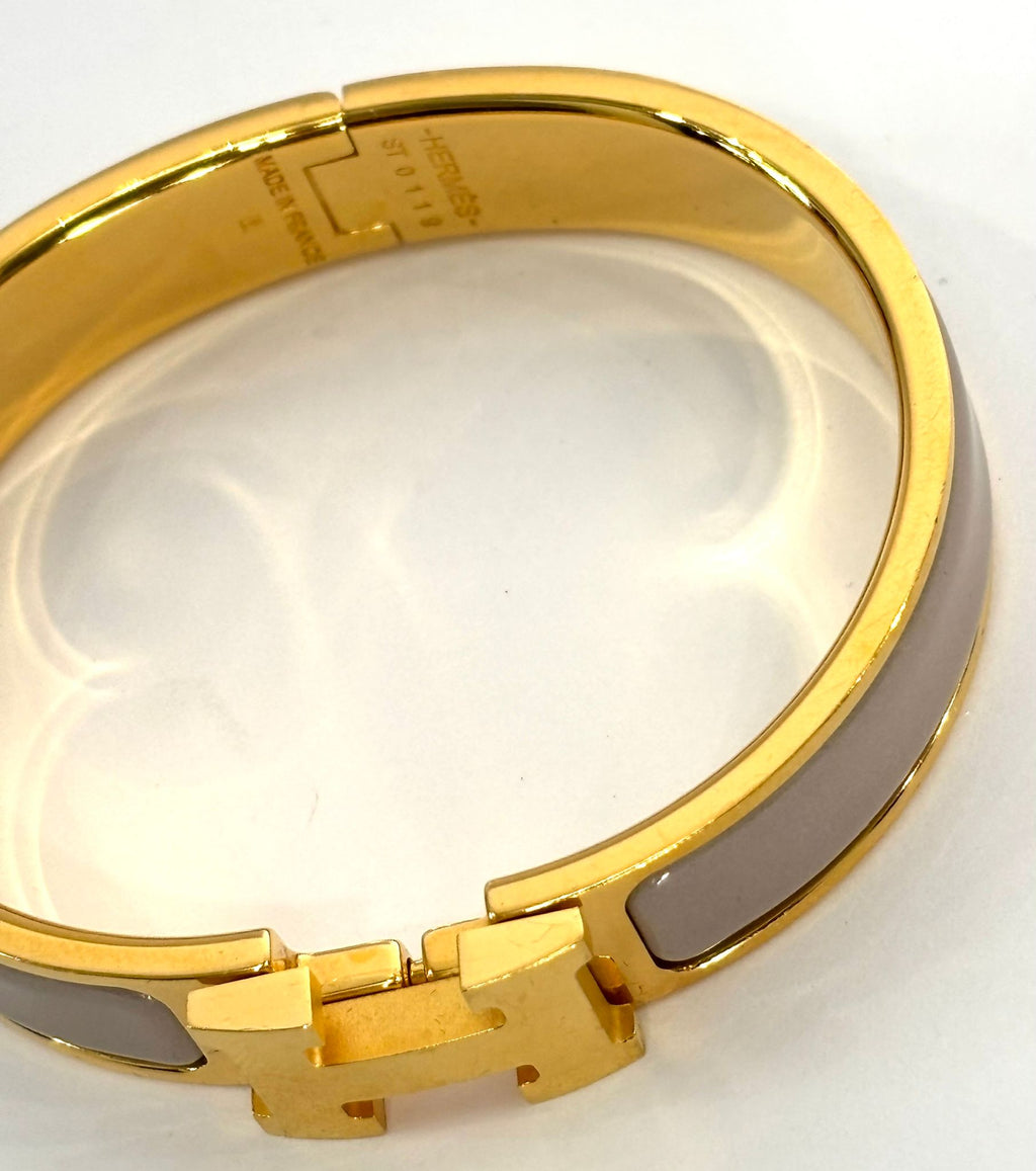 HERMÈS MARRON GLACE ENAMEL AND GOLD METAL CLIC H BRACELET