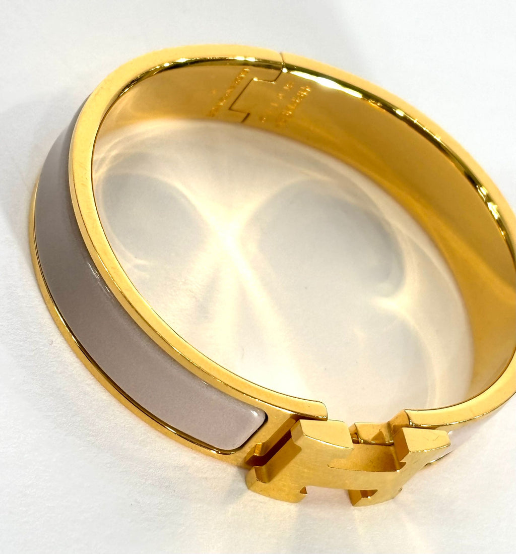 HERMÈS MARRON GLACE ENAMEL AND GOLD METAL CLIC H BRACELET