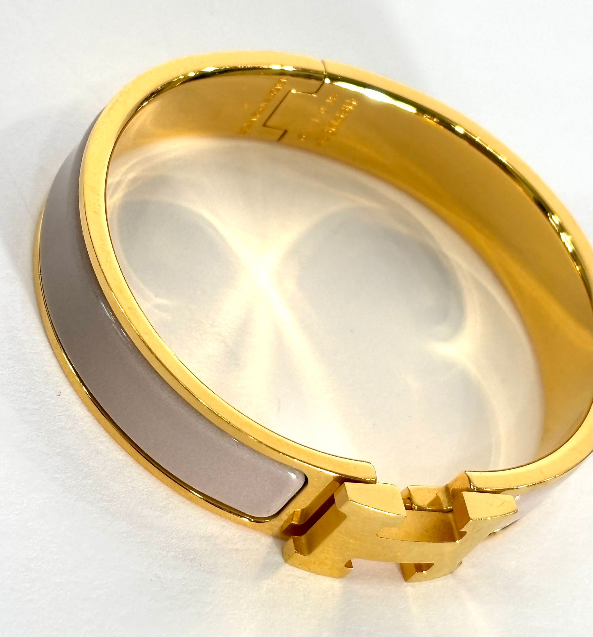 HERMÈS MARRON GLACE ENAMEL AND GOLD METAL CLIC H BRACELET