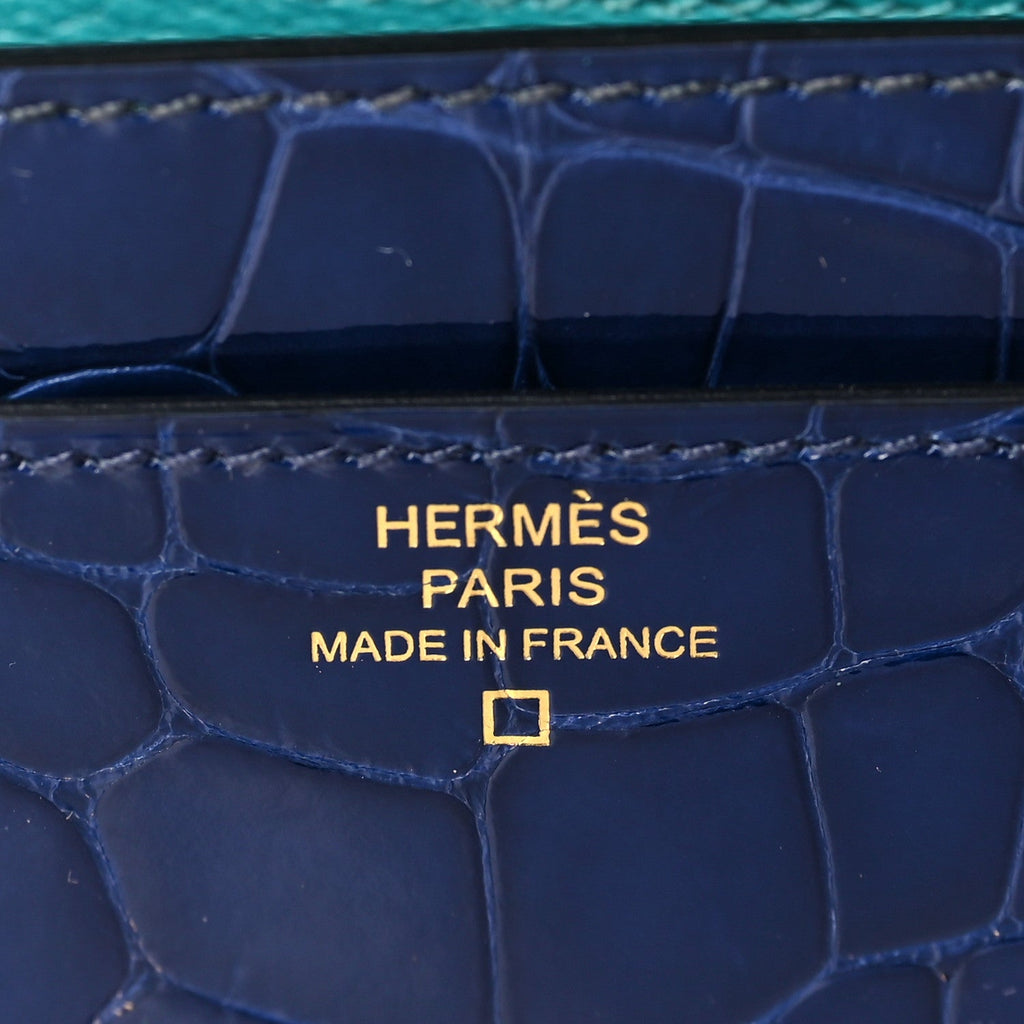 HERMÈS SHINY ALLIGATOR CONSTANCE WALLET