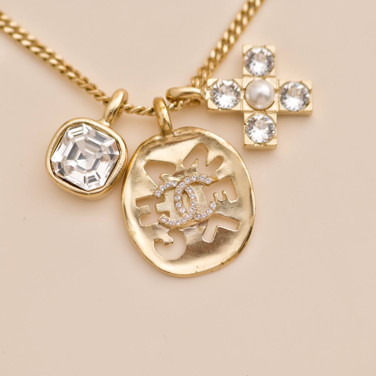 Chanel 2021 Multi Motif Crystal Gold Tone Pendant Necklace