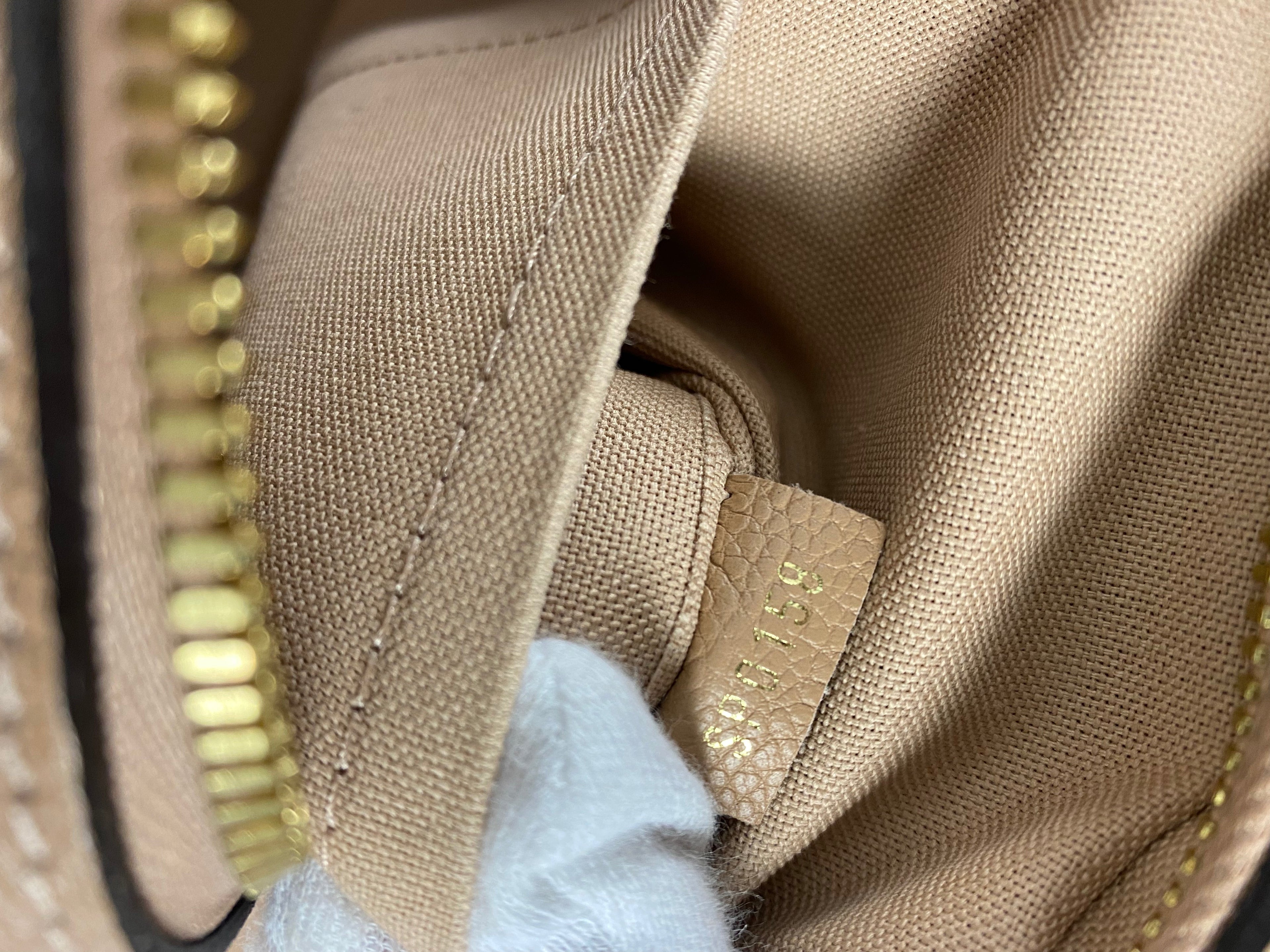 Louis Vuitton Empreinte Leather Vosges MM Papyrus Bag