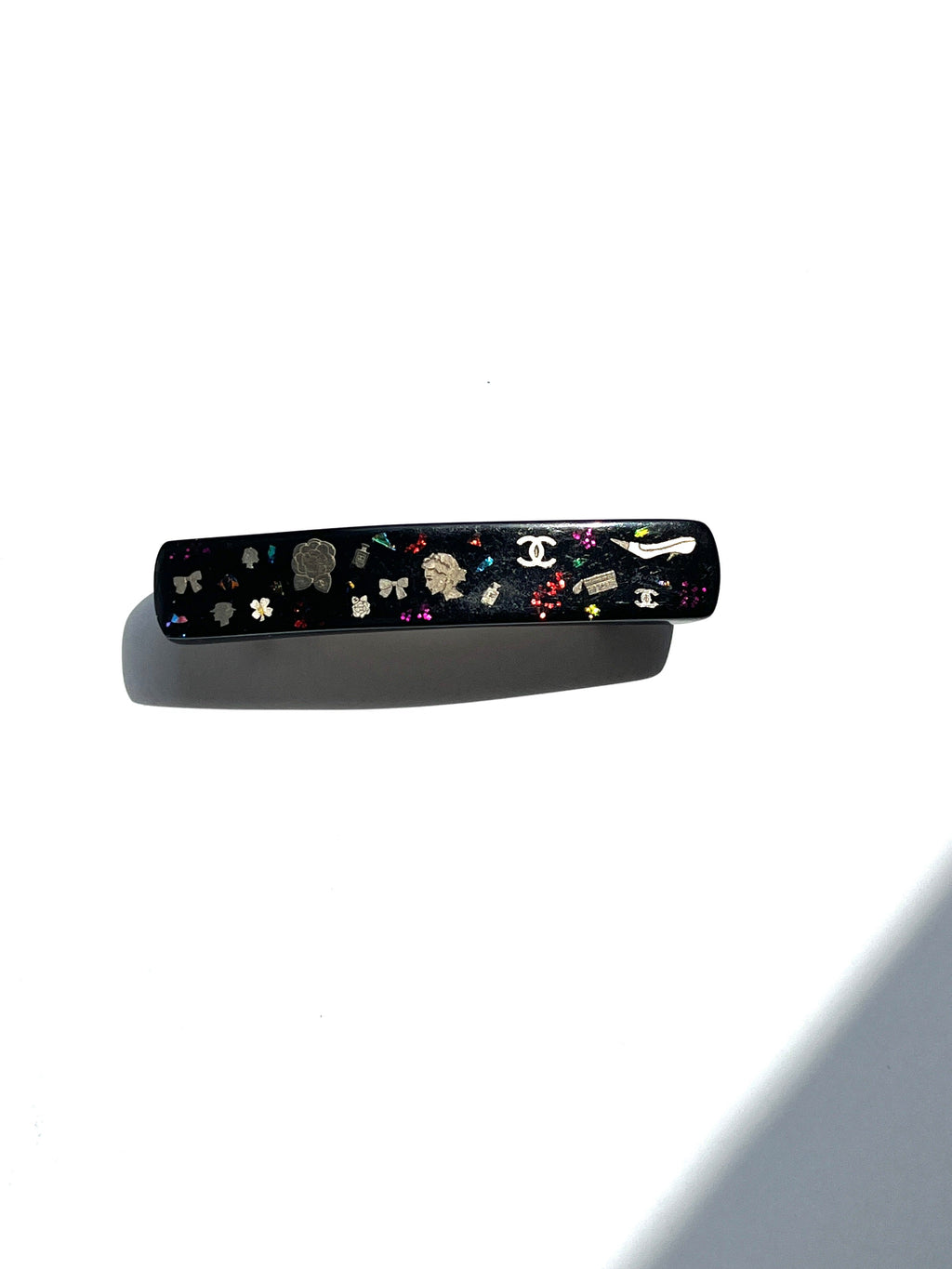 CHANEL Black Multi Logo Glitter Embellished Print Hair Clip