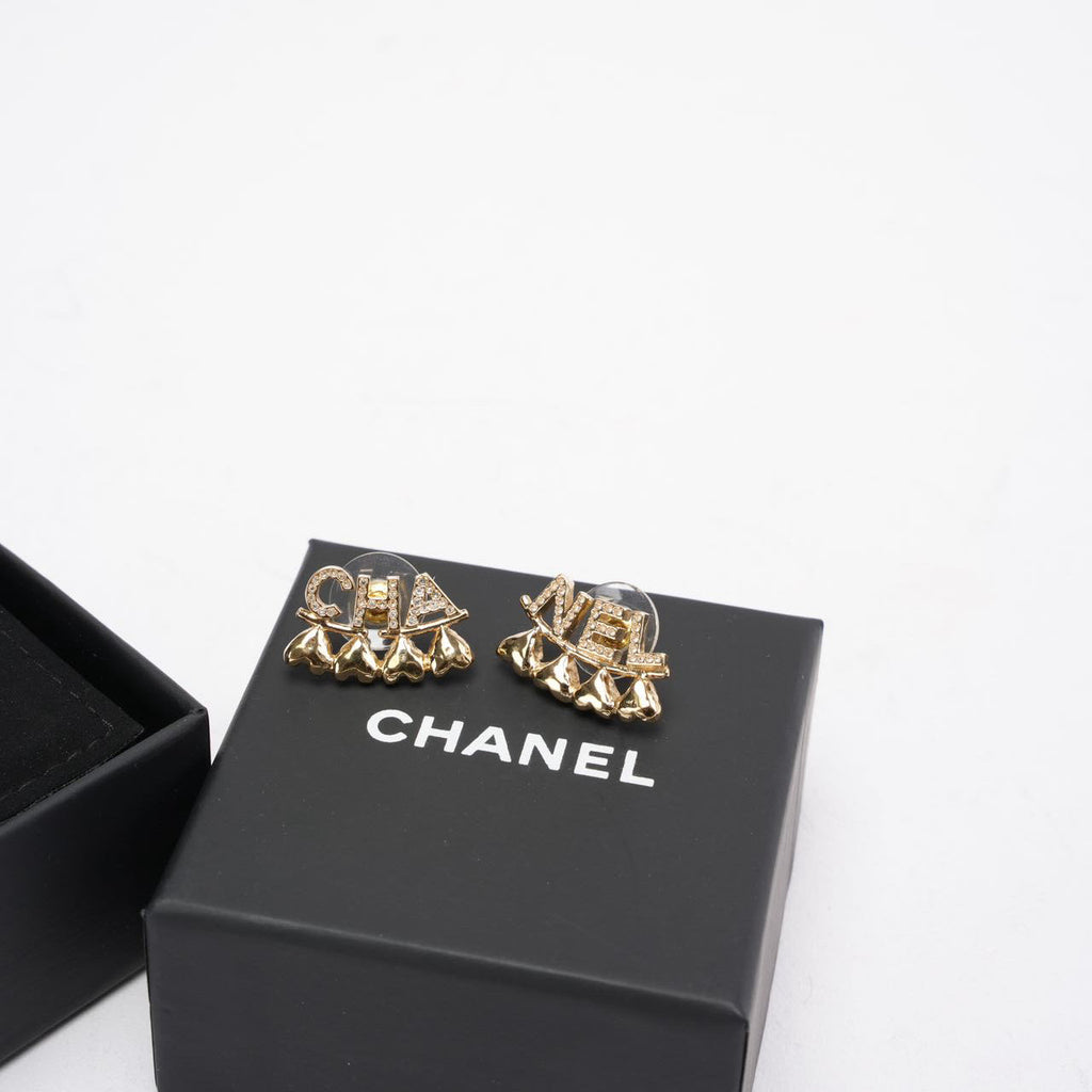 Chanel Metal / Rhinestone Stud Earrings with Gold Buckle