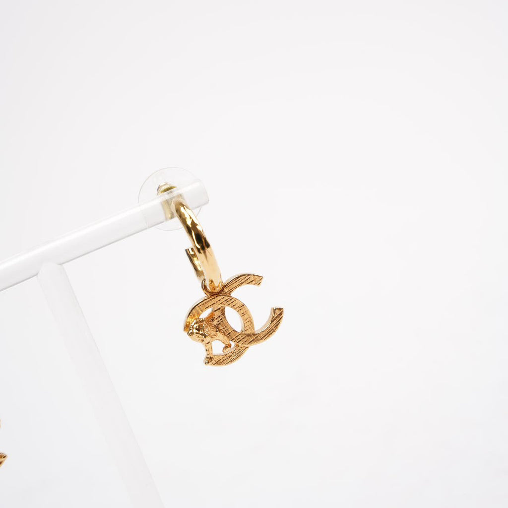 Chanel Gold Tone Metal CC Mark Lion Hoop Earring