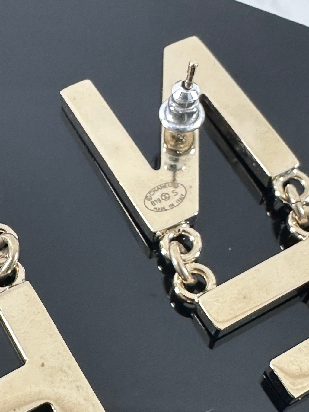 Chanel 19S Light Goldtone Spellout Logo Drop Earrings