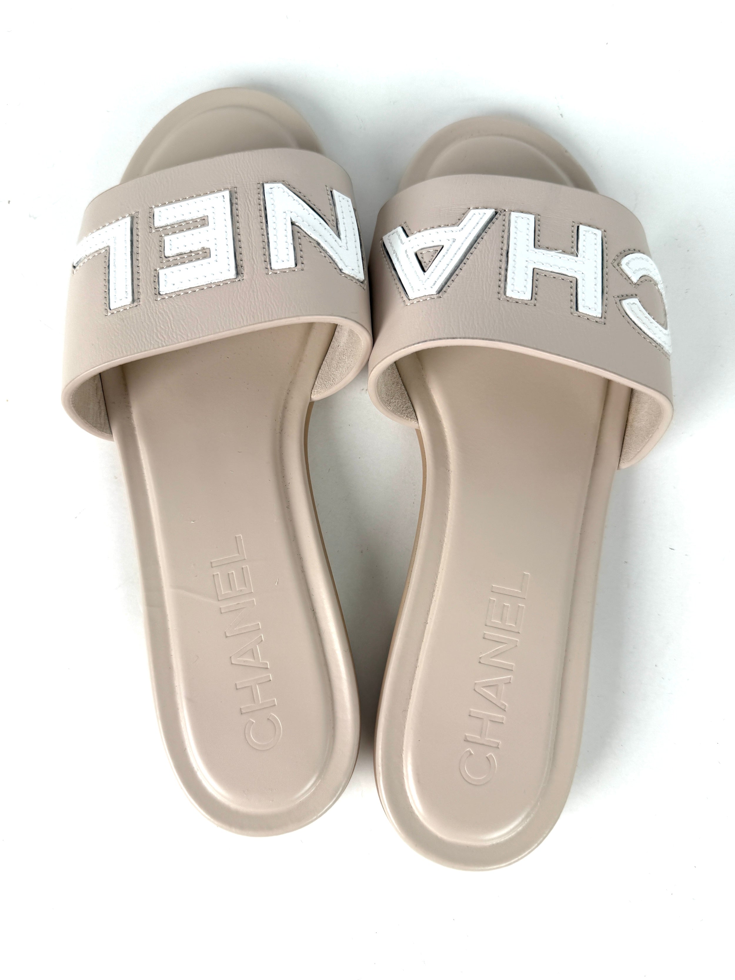 CHANEL Print Logo Neutral White Slip on Leather Slide Sandals 38 7.5
