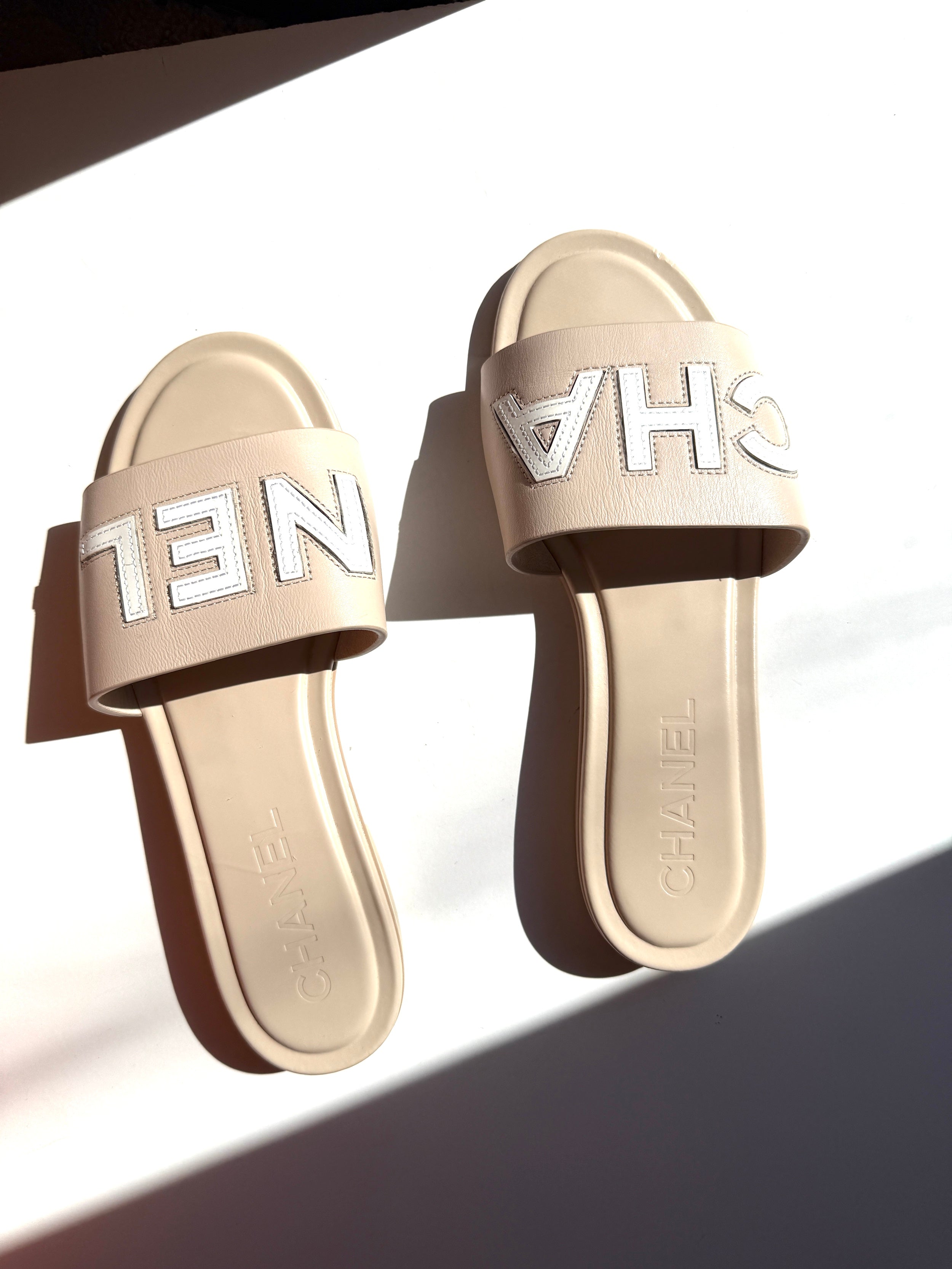 CHANEL Print Logo Neutral White Slip on Leather Slide Sandals 38 7.5