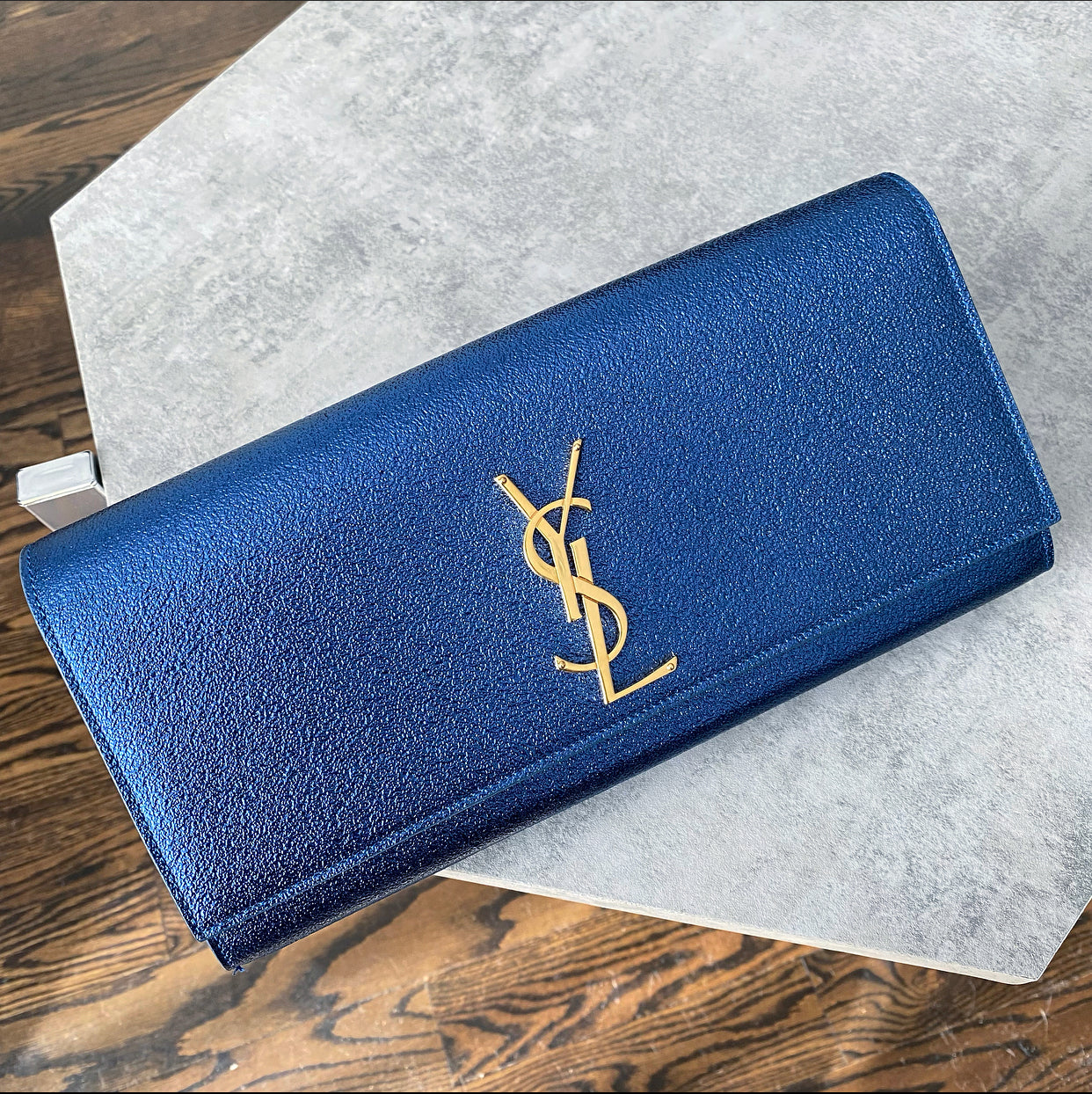 Saint Laurent Metallic Blue Cassandre Clutch Bag