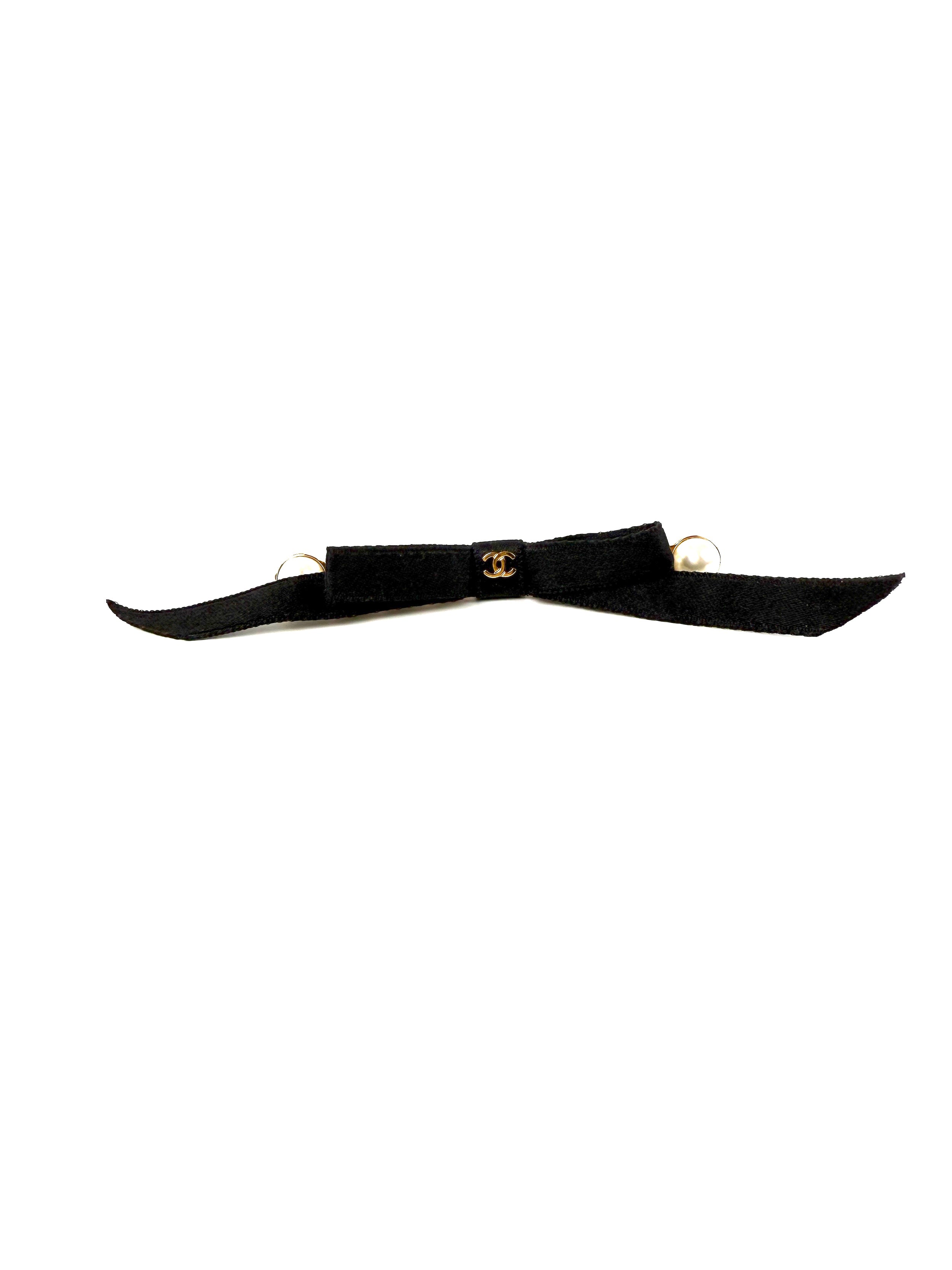 CHANEL Black Faux Pearl Bow CC Logo 2025 Gold hardware Hair Barrette Clip