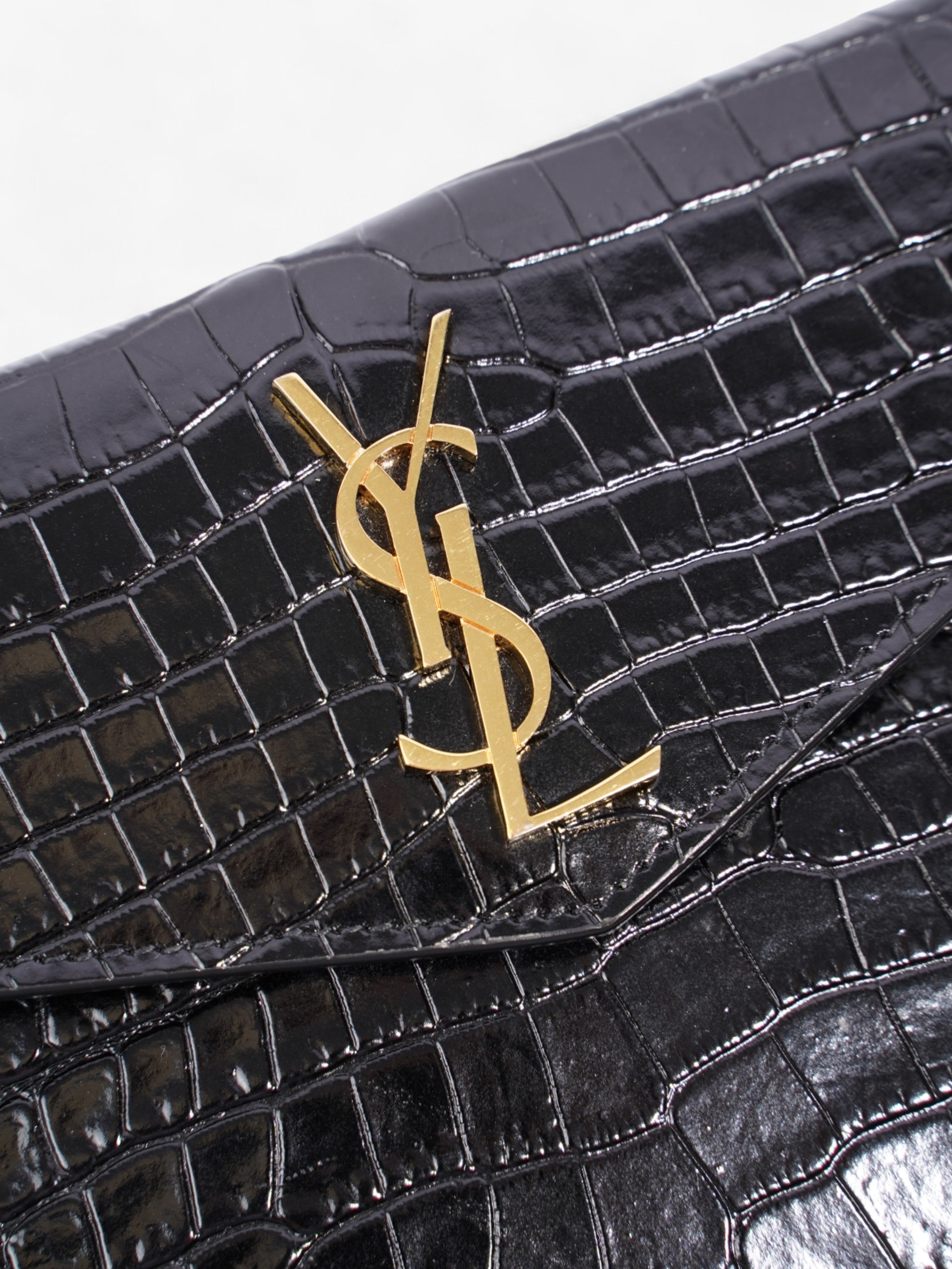 Saint Laurent Uptown Clutch Black Embossed Leather Small
