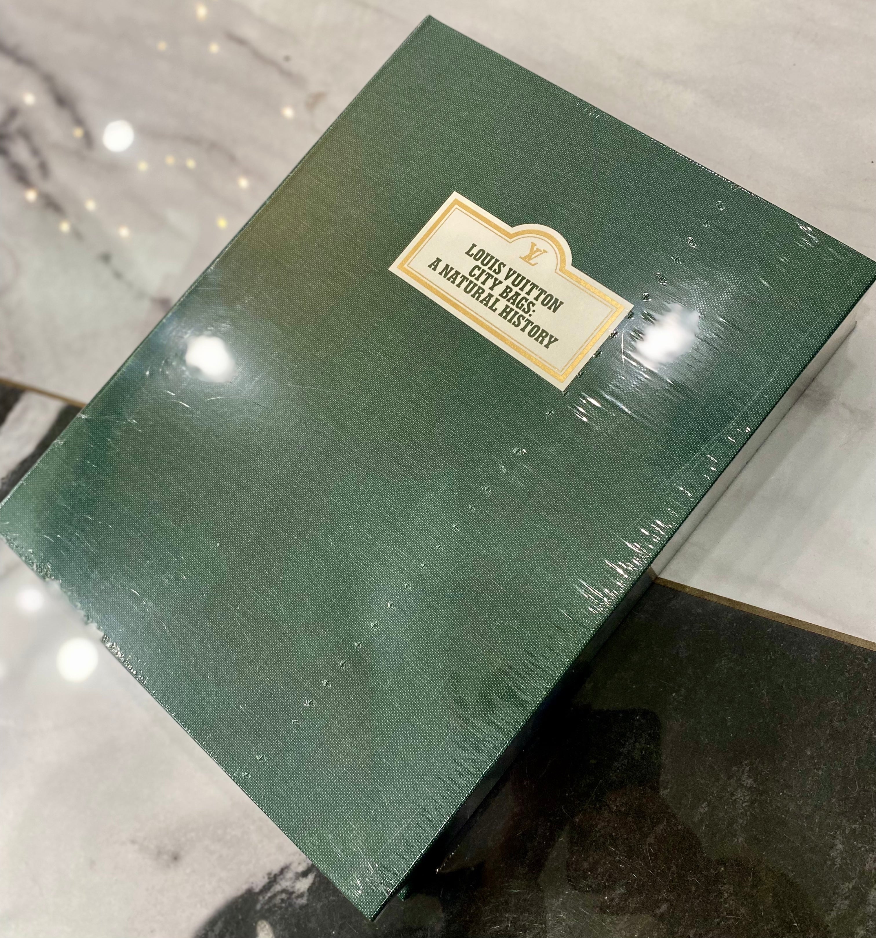 LOUIS VUITTON CITY BAG NATURAL HISTORY BOOK