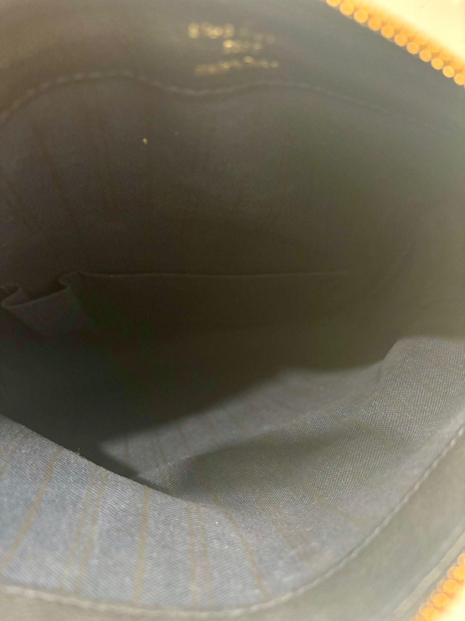 LOUIS VUITTON EMPREINTE LEATHER PETILLANTE INFINI CLUTCH BAG