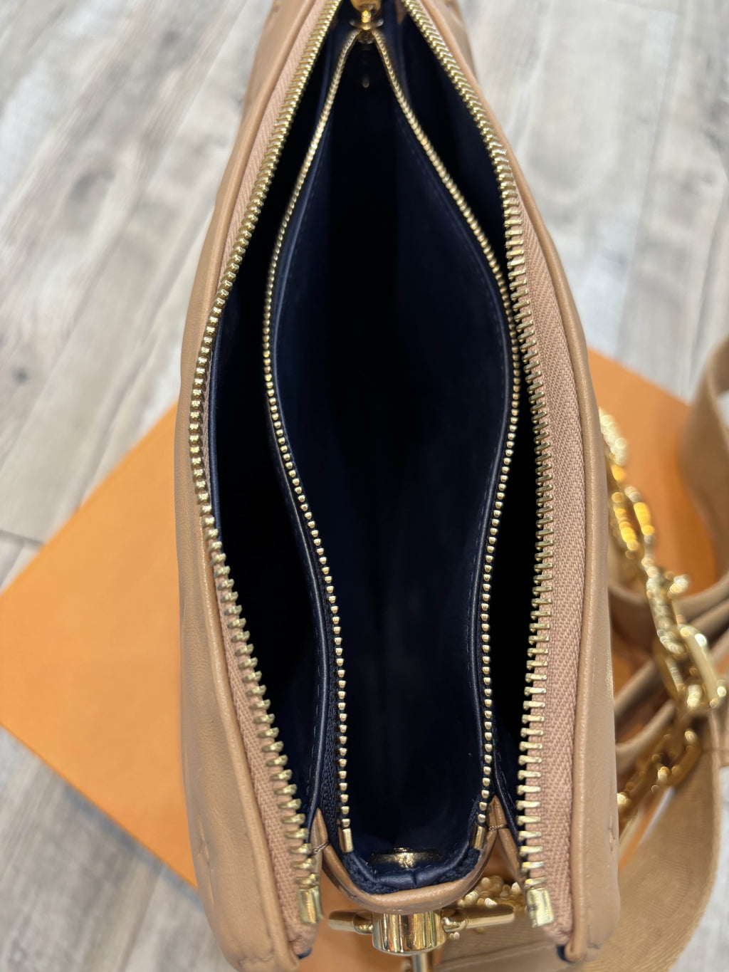 LOUIS VUITTON LAMBSKIN EMBOSSED MONOGRAM COUSSIN PM BAG