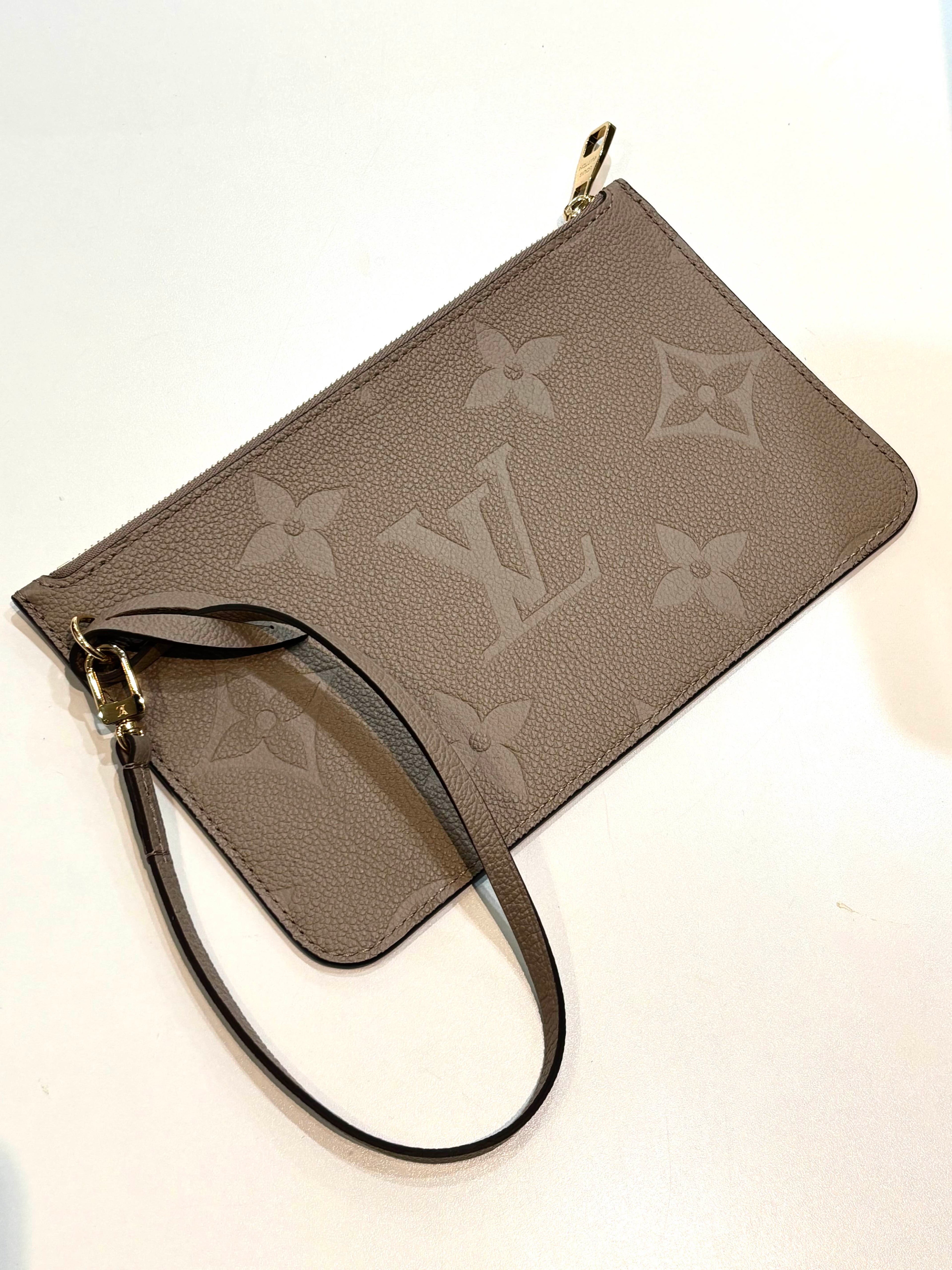 LV NEVERFULL GIANT MONOGRAM EMPREINTE  POCHETTE WRISTLET
