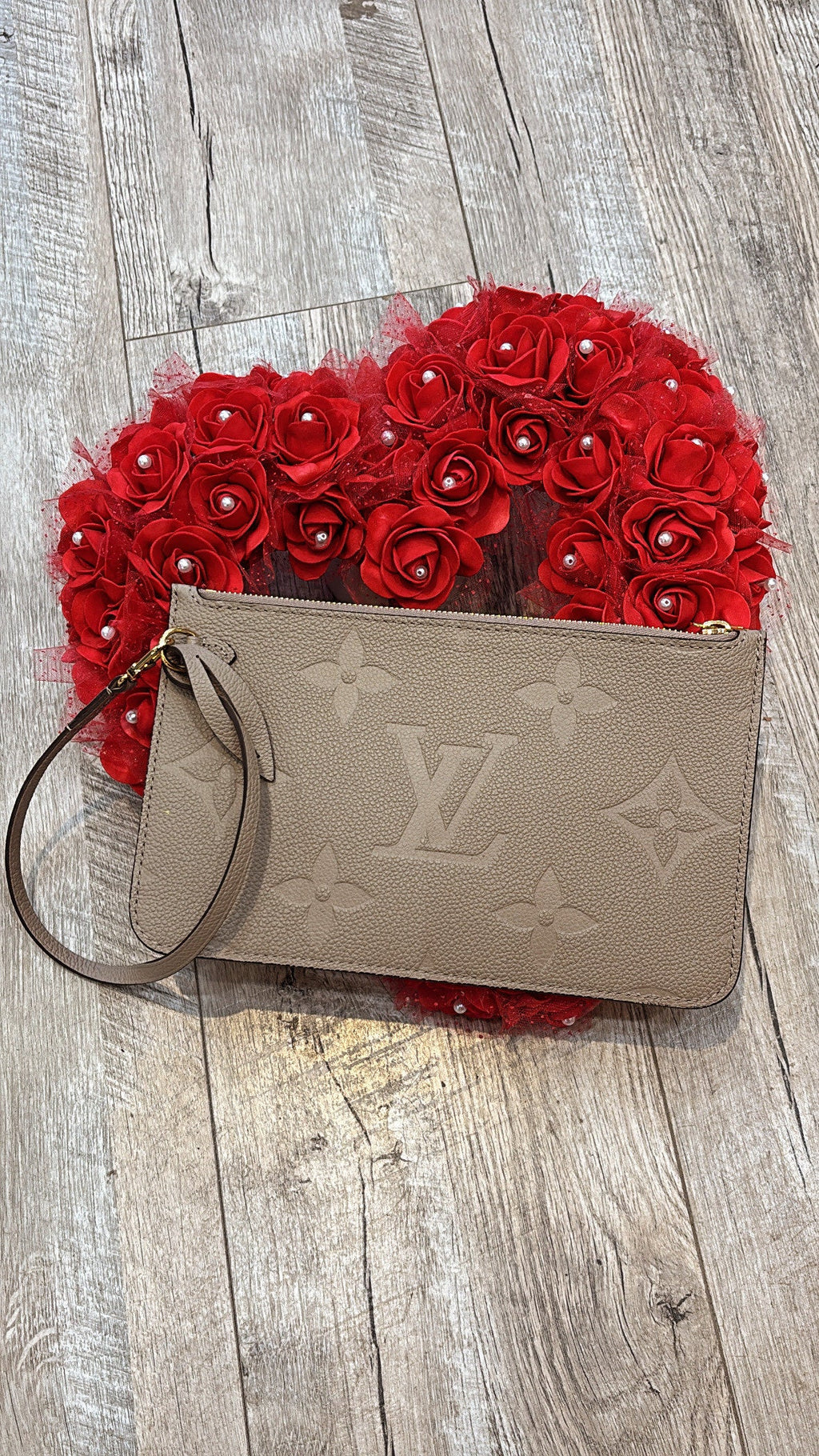 LV NEVERFULL GIANT MONOGRAM EMPREINTE  POCHETTE WRISTLET