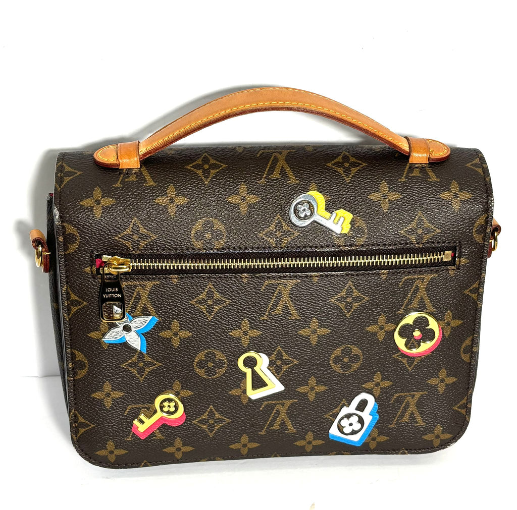 LOUIS VUITTON MONOGRAM LOVE LOCK POCHETTE METIS