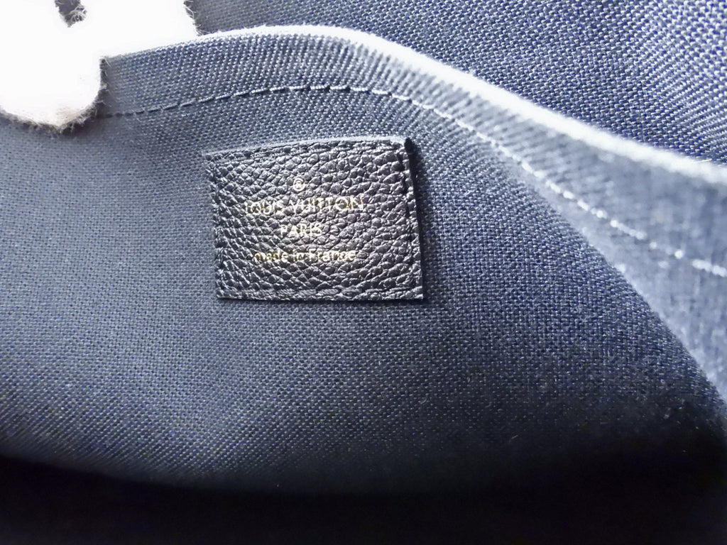 Louis Vuitton Monogram Empreinte Daily Clutch Bag