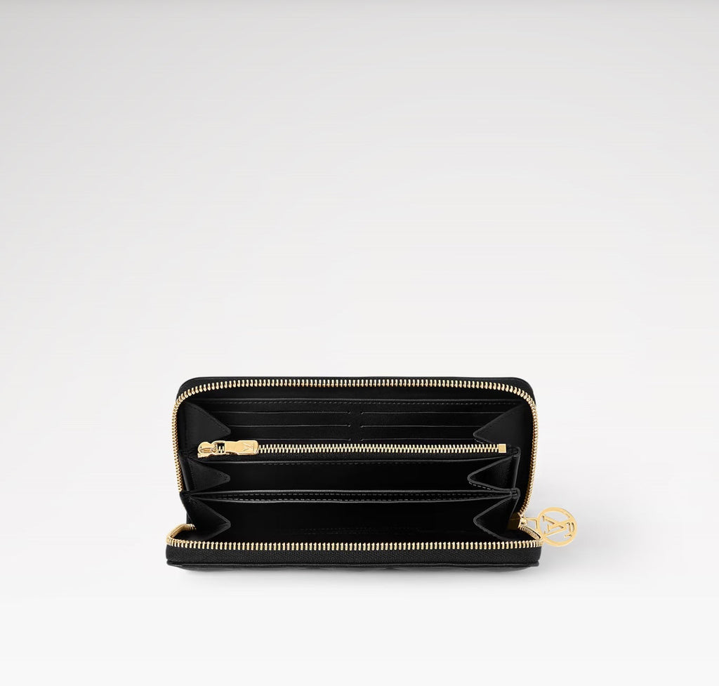 LOUIS VUITTON LAMBSKIN EMBOSSED MONOGRAM COUSSIN ZIPPY WALLET