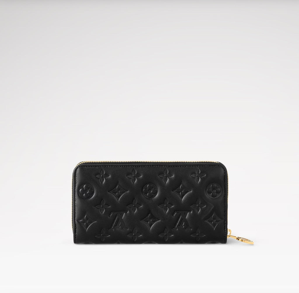 LOUIS VUITTON LAMBSKIN EMBOSSED MONOGRAM COUSSIN ZIPPY WALLET
